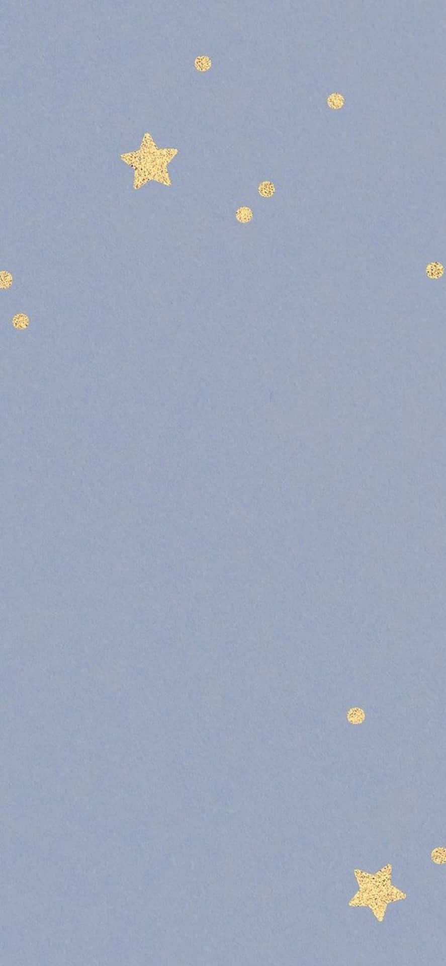 帶有金色閃粉星星和圓點的藍色背景，營造夢幻夜空效果。