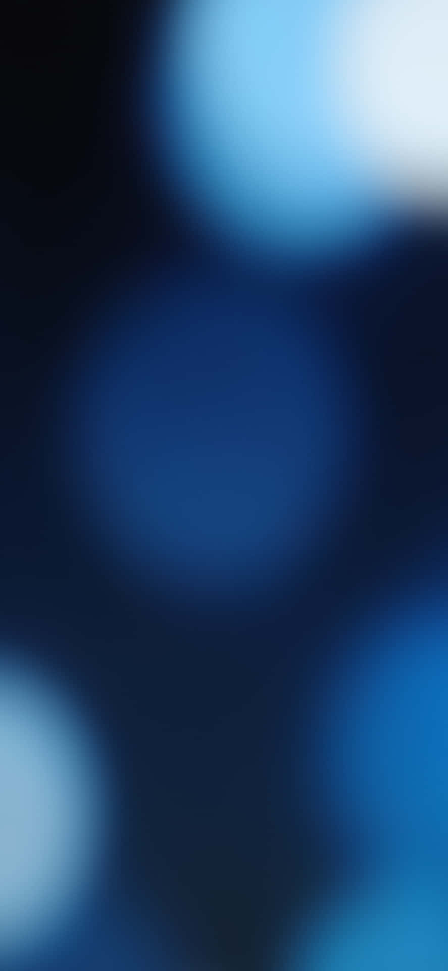 柔和發光的藍色燈光在深色背景上柔和地模糊