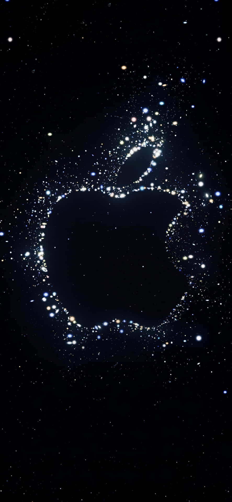 在繁星點點的夜空中，以閃爍星星勾勒出的Apple標誌。