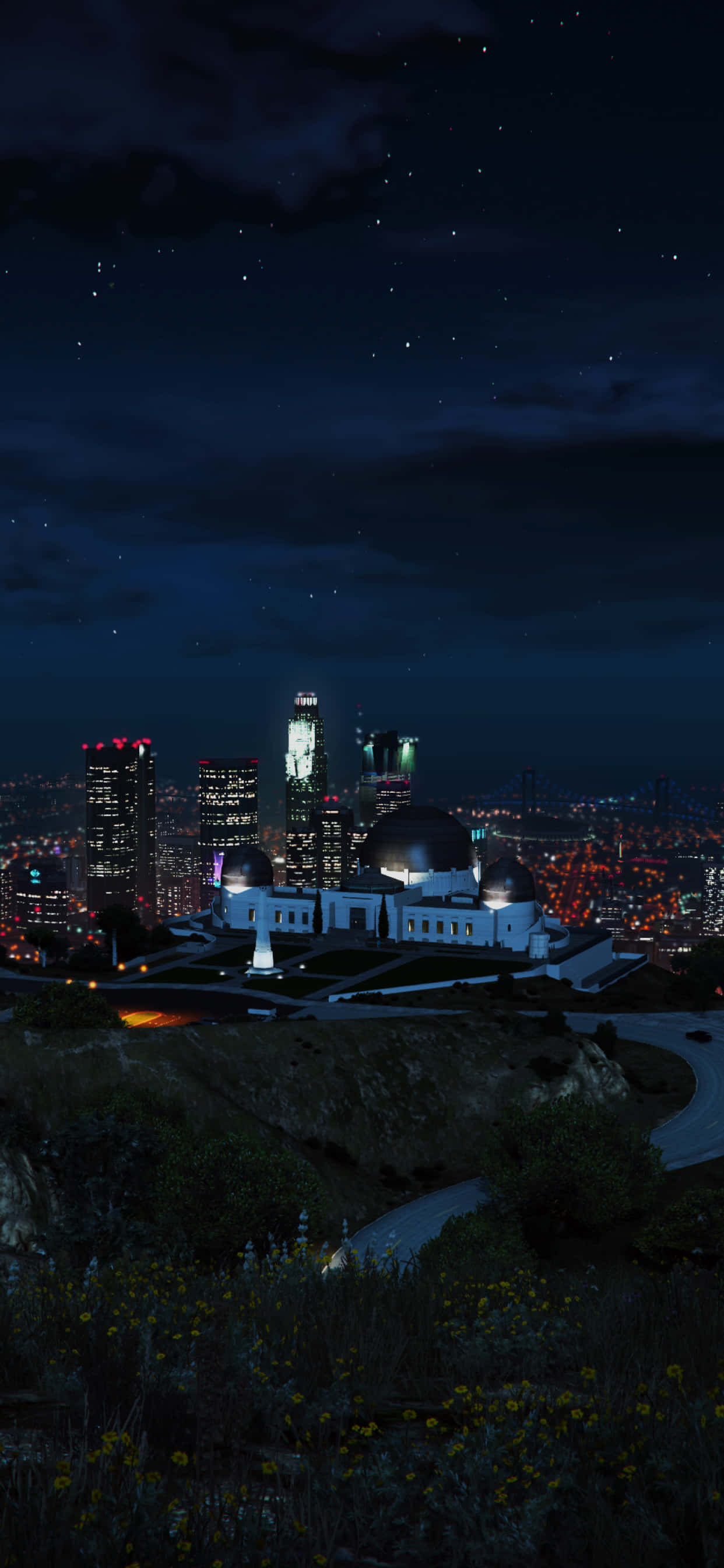 iPhone XS Max《GTA V》洛聖都夜景背景 壁紙 — 格里菲斯天文台在星空下閃耀的夜景，下方是廣闊的城市景觀和燈火通明的摩天大樓。