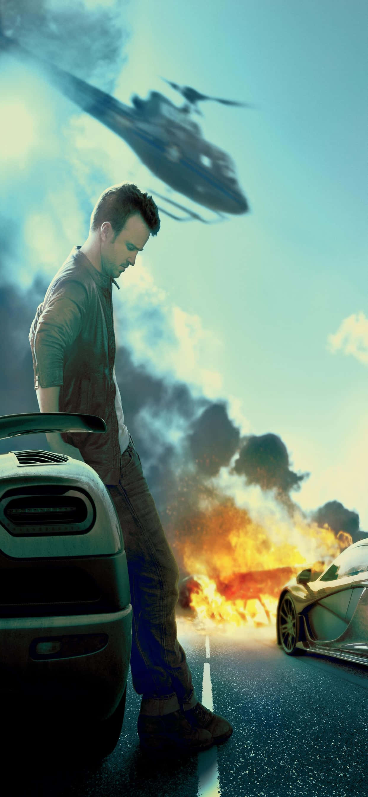 iPhone XS Max《Need for Speed Heat》燃燒背景 壁紙 — 一名男子站在一輛時尚的汽車旁邊，另一輛汽車在他身後燃燒，上方有直升機的影子。