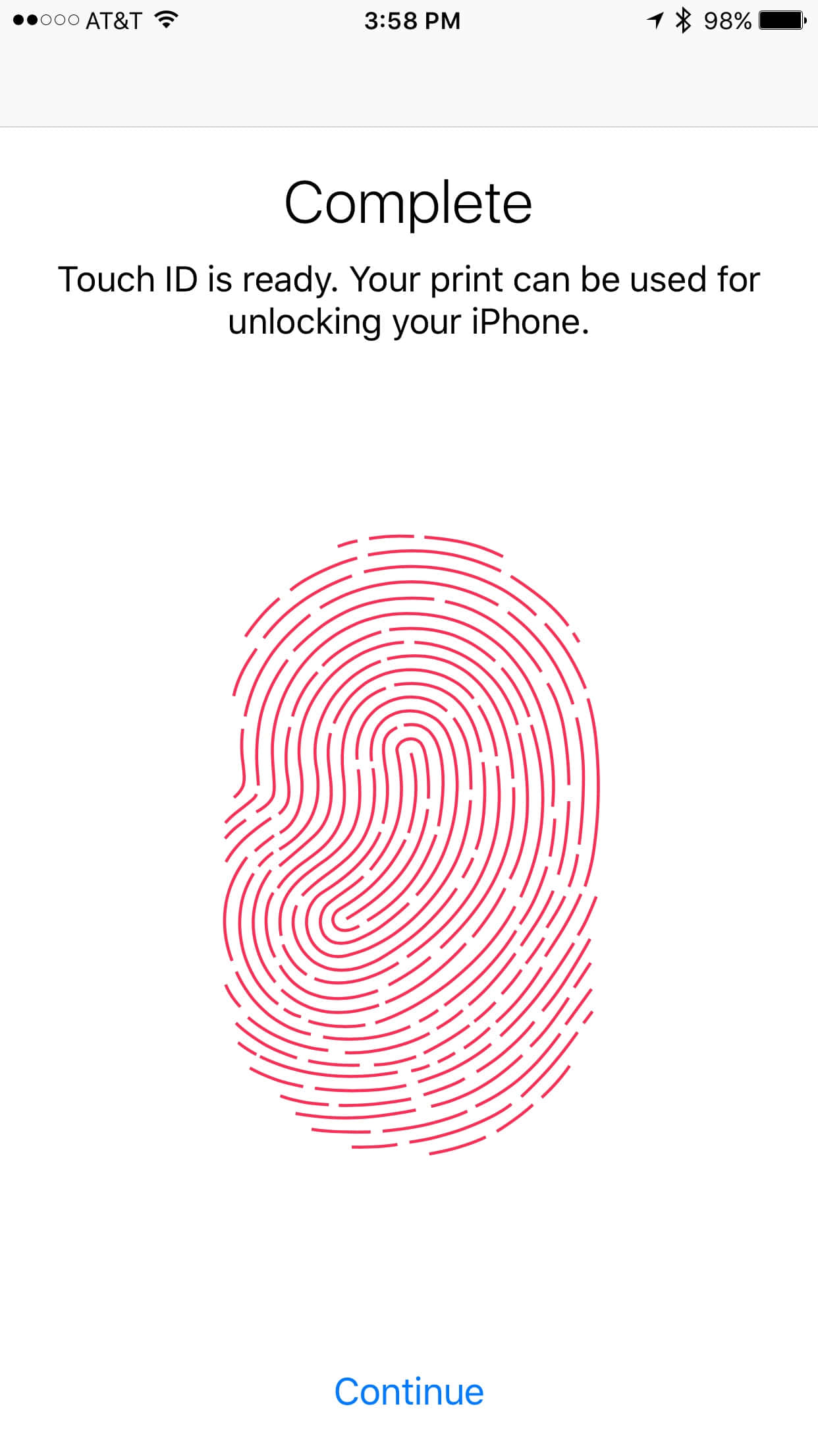 iPhone Touch ID 設定完成螢幕，帶有紅色指紋圖形。 — 唔好掂我部iPad 壁紙