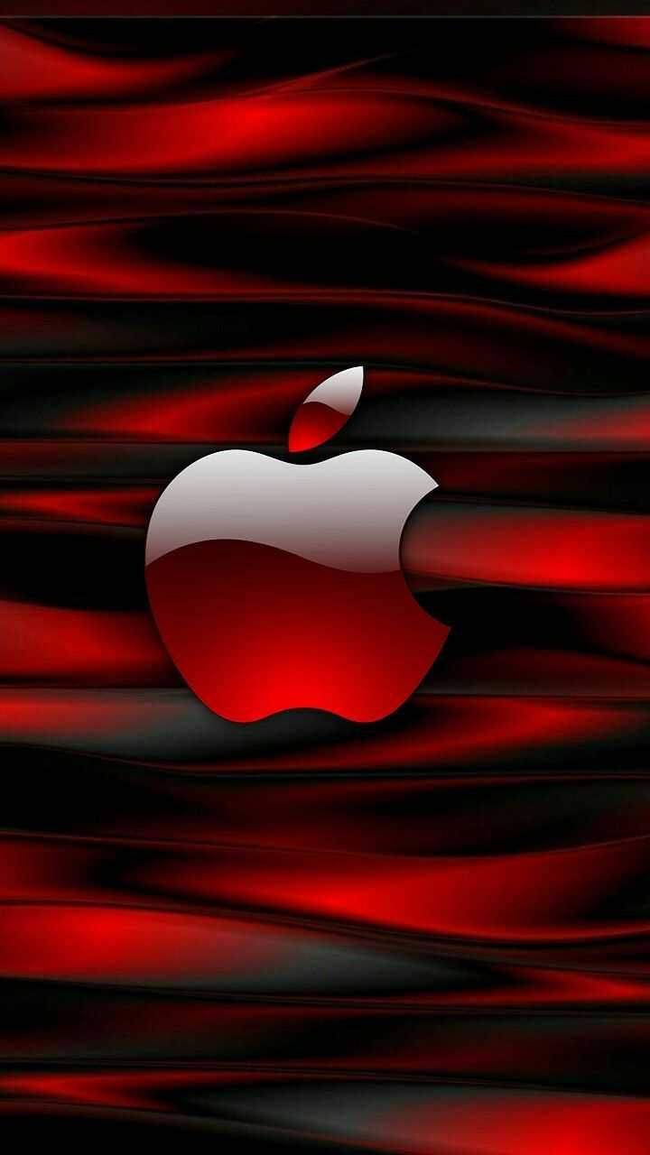 紅色和黑色布料背景上的亮面Apple標誌