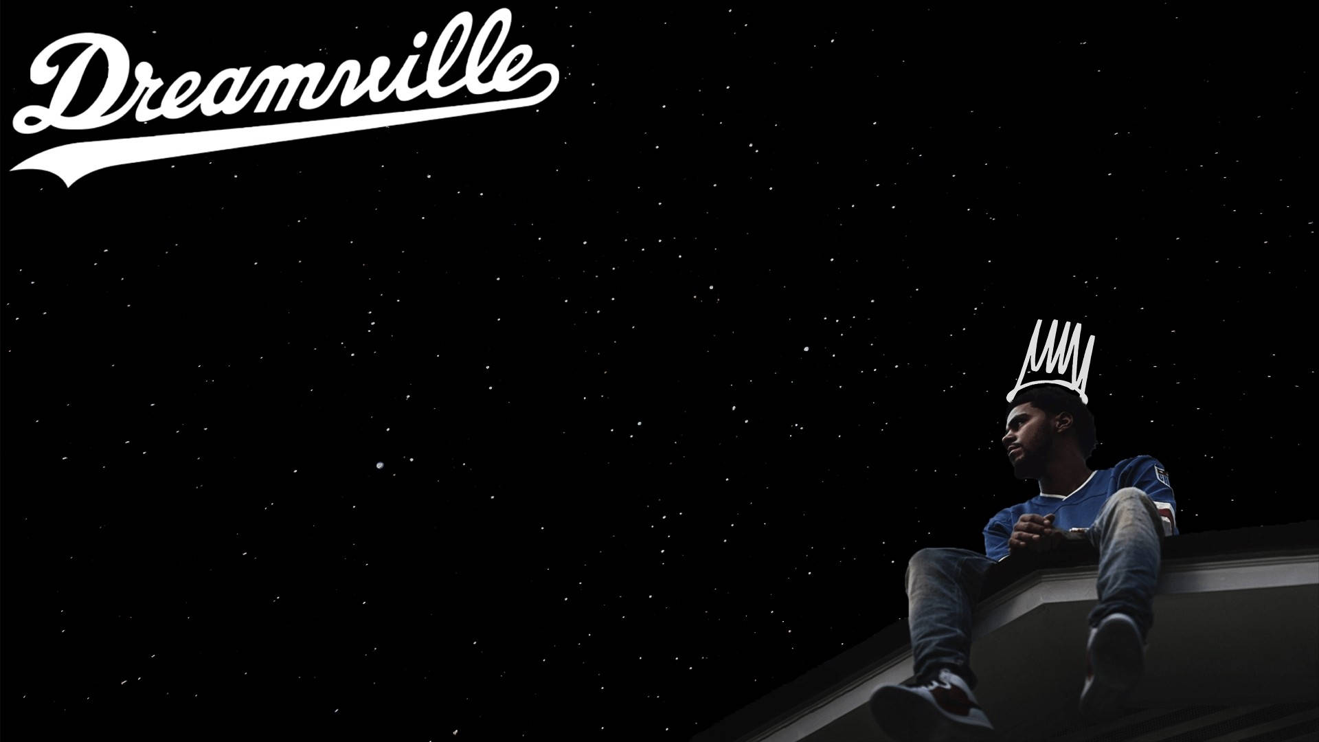 J Cole《Dreamville》屋頂造型 壁紙 — 一個戴著皇冠的年輕男子坐在屋頂上，凝視著繁星點點的夜空，角落有「Dreamville」標誌。