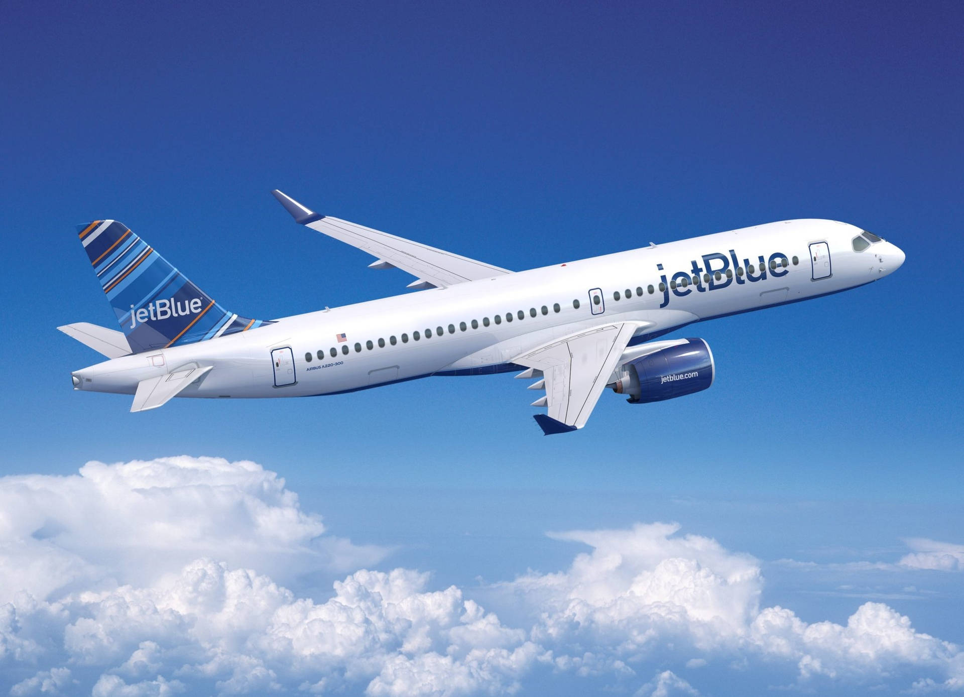 JetBlue飛機在藍天白雲上飛行