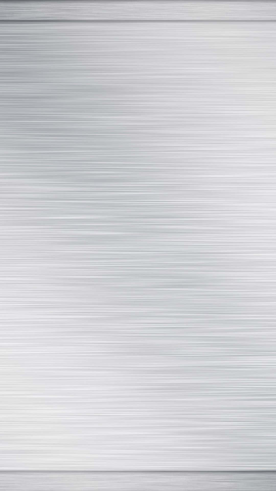 帶有柔和漸變燈光的拉絲銀金屬紋理。 — 美學白色動態圖 壁紙