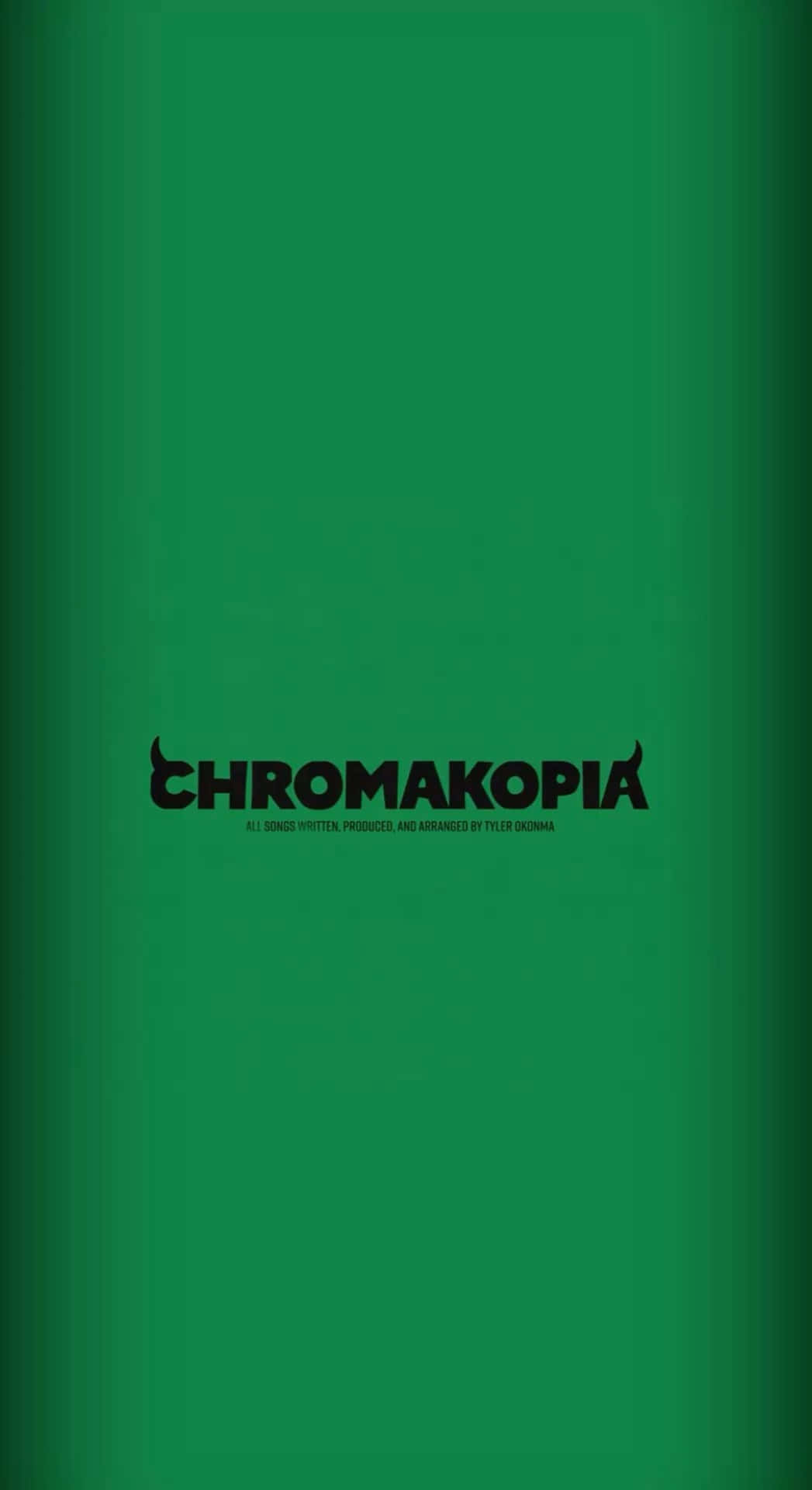  壁紙 — 簡約綠色牆紙，上面有粗體黑色文字 'CHROMAKOPIA'，字母上方帶有角狀裝飾。