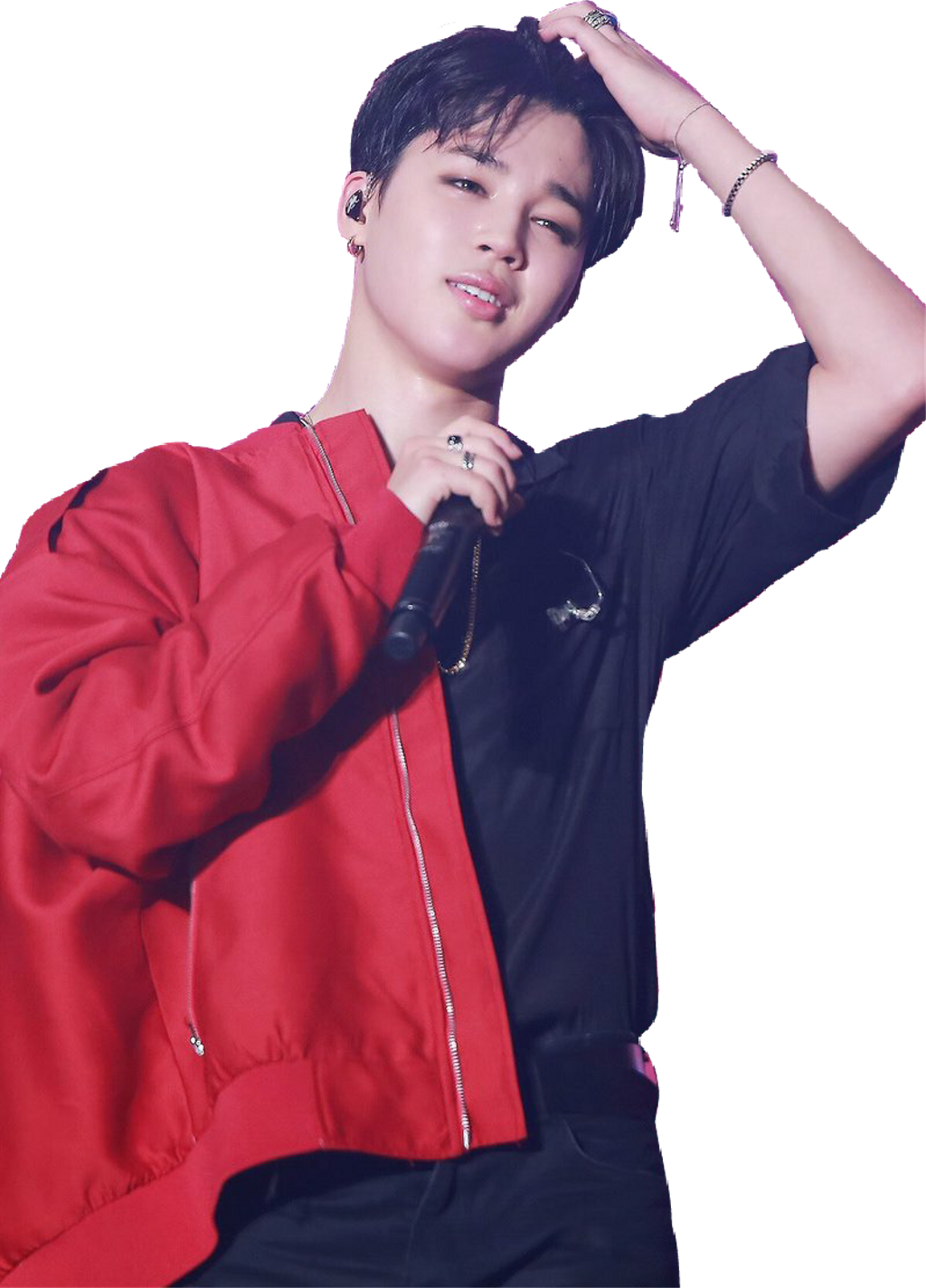 Jimin 舞台表演 壁紙 — 一個穿著紅色外套的年輕男子拿著麥克風，在黑色背景前微笑並觸摸自己的頭髮。