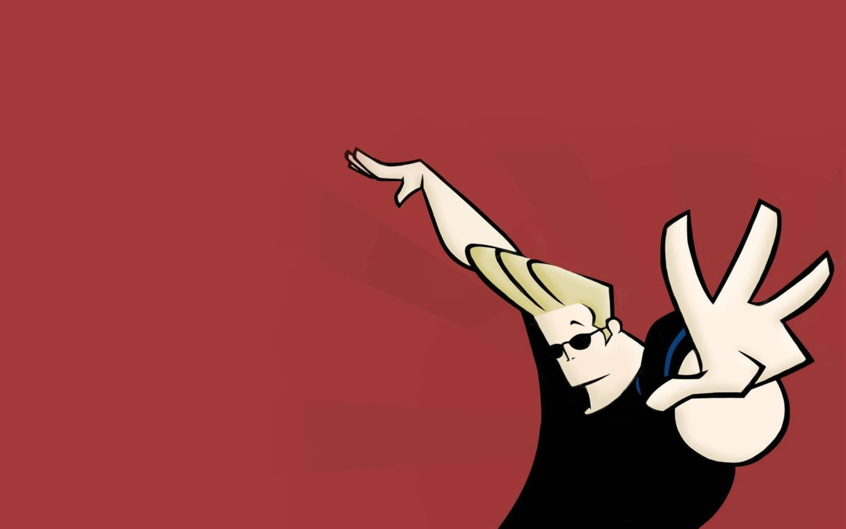 動畫《Johnny Bravo》帥氣造型 壁紙 — 一個風格化的卡通角色，金髮戴太陽眼鏡，在純紅色背景上擺出動感姿勢。