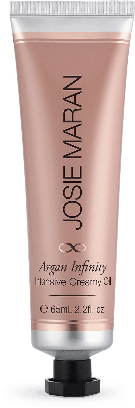 Josie Maran 橄欖油無限滋養乳油 壁紙 — 一支纖細的玫瑰金色 Josie Maran Argan Infinity Intensive Creamy Oil 管子豎立在純黑色背景前。