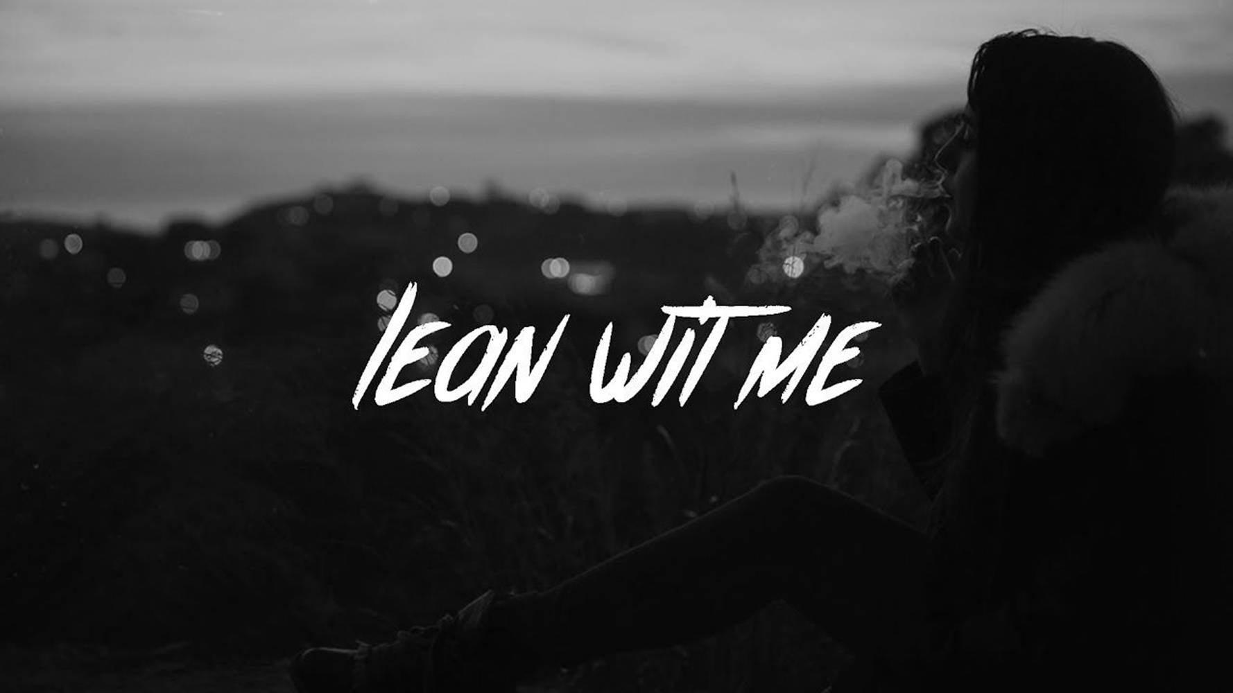暮色中吸煙的人，散景燈光和文字 lean wit me