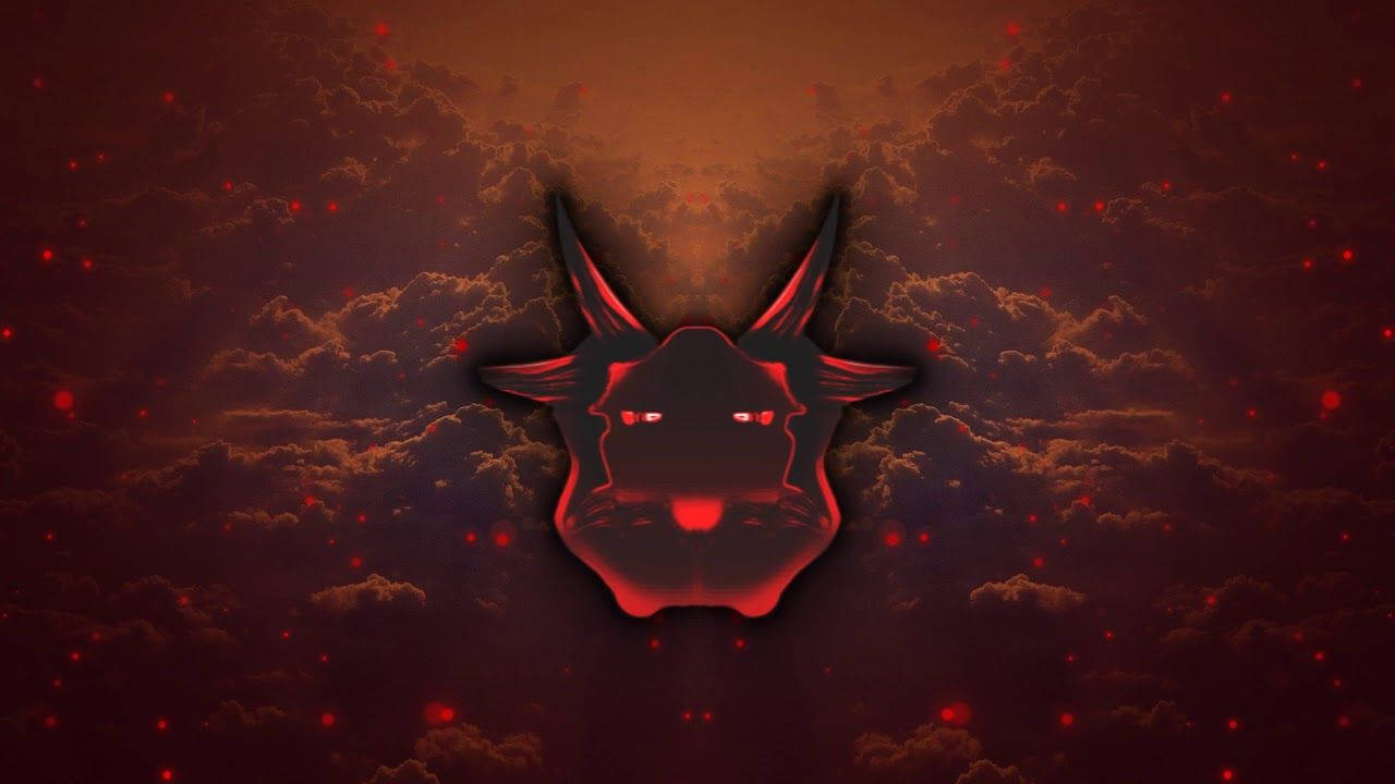 Juice Wrld以生動影像詮釋深沉音樂 壁紙 — 一個發光的紅色惡魔牛頭，帶有角，從旋轉的烏雲中浮現，背景是火熱的天空。