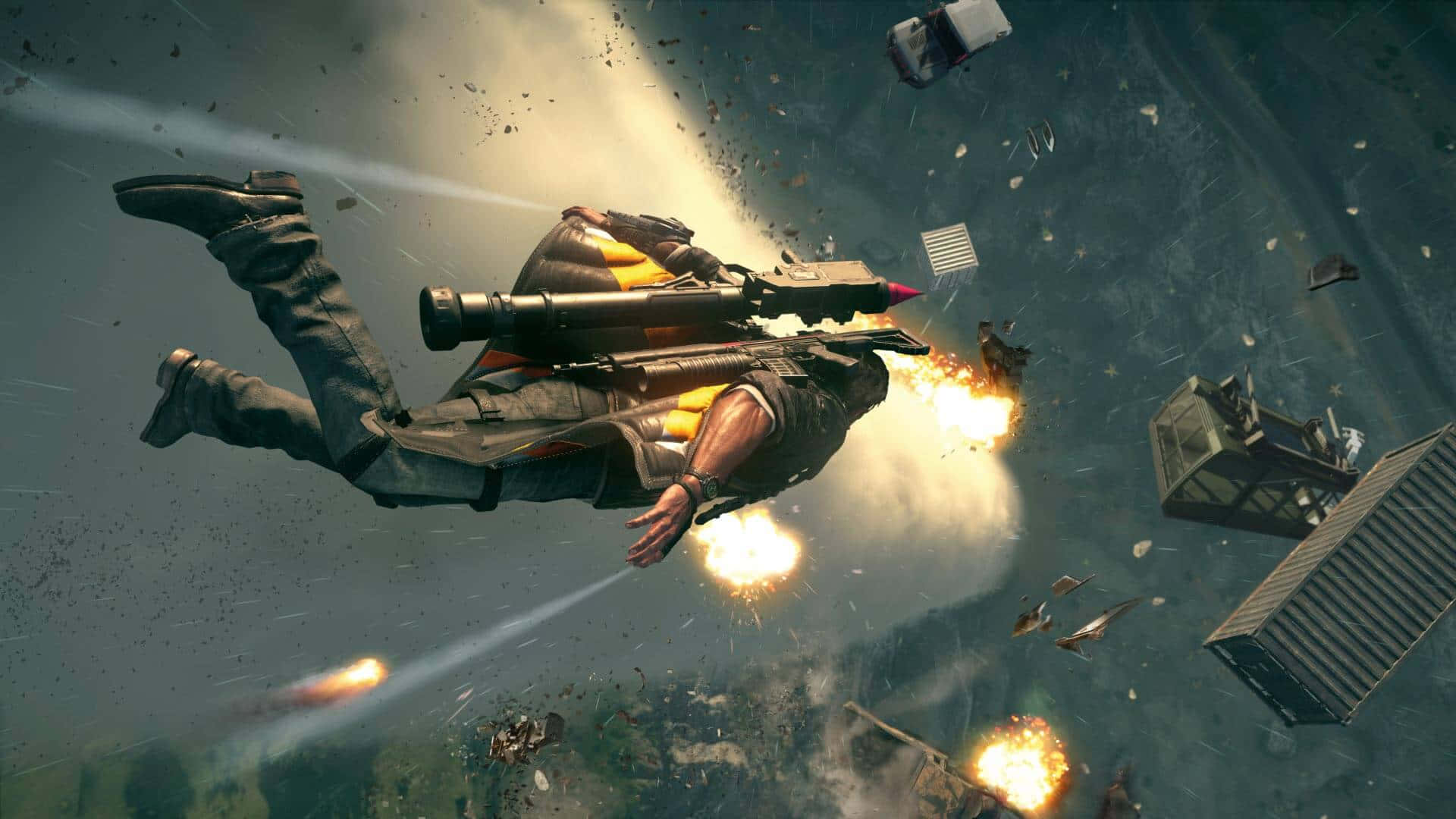 Just Cause 4 1920x1080 背景：飄浮物體 壁紙 — 一名士兵在半空中發射火箭炮，周圍是爆炸碎片和墜落的車輛，處於混亂的城市戰場。