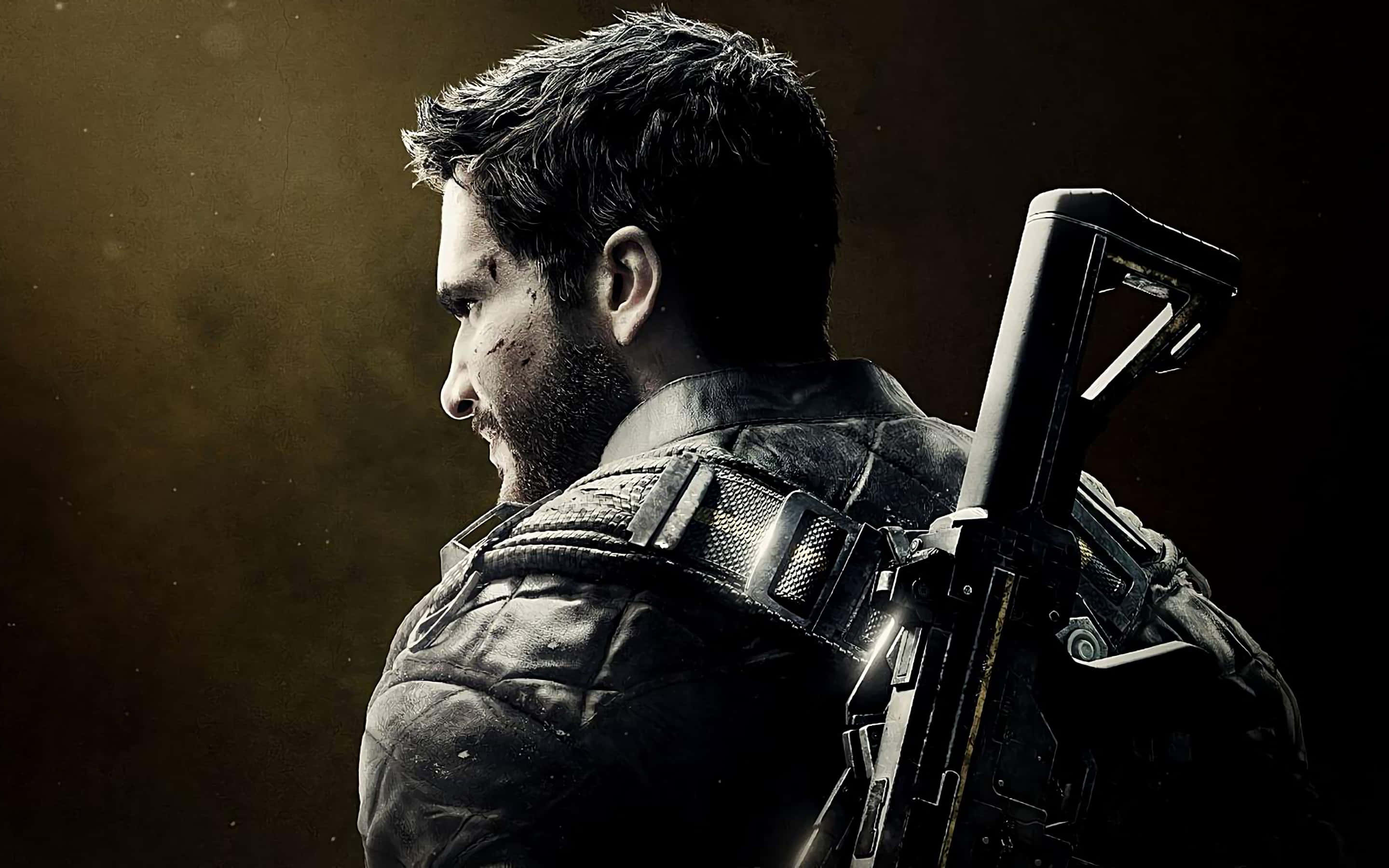 《Just Cause 4》震撼遊戲美術 壁紙 — 一個粗獷的士兵身穿戰術裝備，步槍掛在肩上，站在昏暗、佈滿灰塵的光線中。