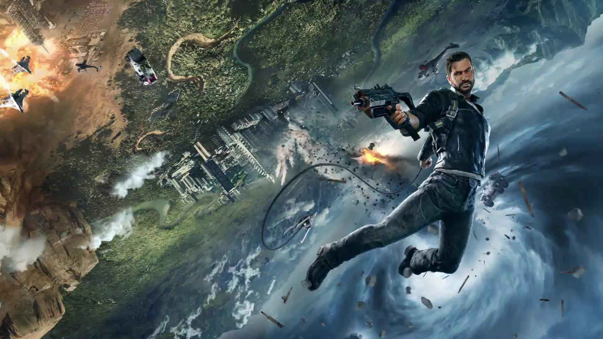 Just Cause 4中等待探索的壯闊世界 壁紙 — 一個穿著黑色皮褸的男人在暴風雨的天空中墜落，同時向著一個充滿爆炸和飛行車輛的破碎城市開槍。