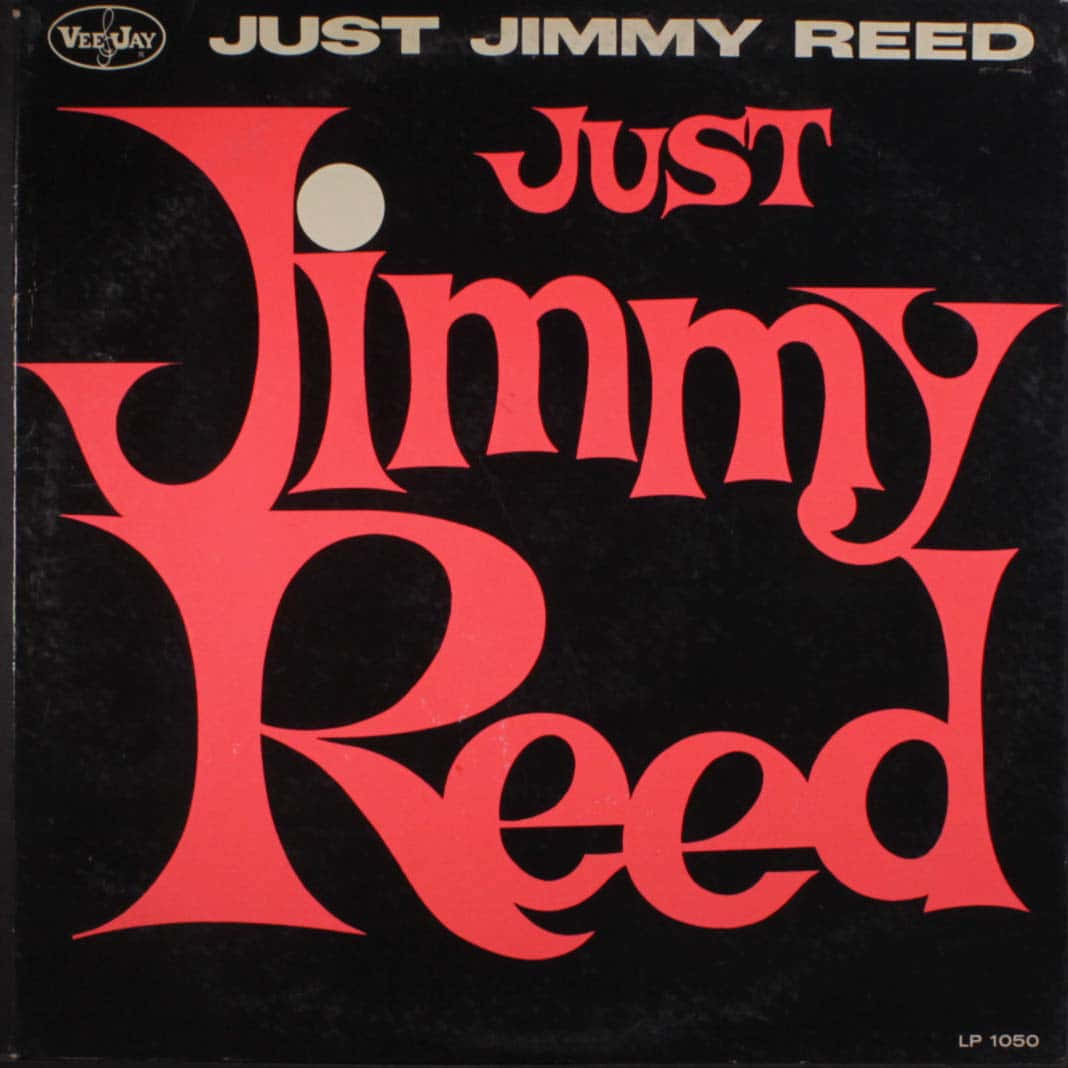 《Just Jimmy Reed》黑紅色乙烯唱片封面 壁紙 — 粗體紅色風格文字在紋理黑色背景上拼寫出「Just Jimmy Reed」，帶有復古專輯品牌標識。