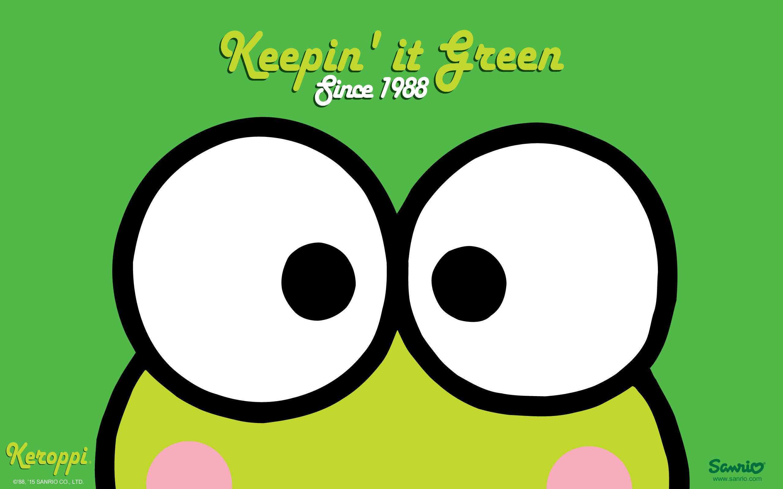 Keroppi堅持綠色 壁紙 — 一隻快樂的卡通青蛙，有大大的白色眼睛和粉紅色臉頰，凝視著純綠色背景，上面有「Keepin' it Green Since 1988」文字。