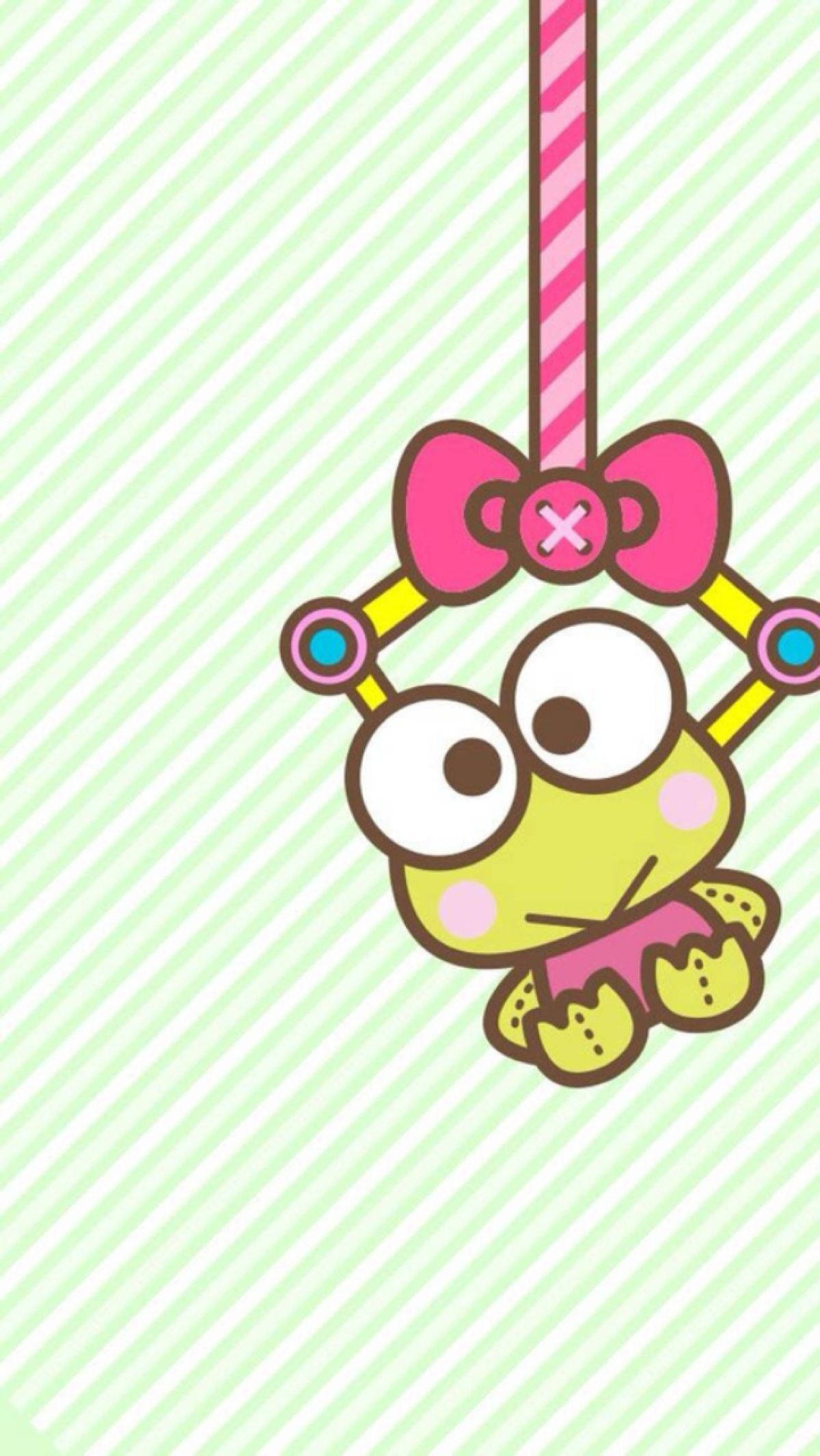 Keroppi柔綠色 壁紙 — 一隻可愛的大眼睛卡通青蛙，戴著粉紅色蝴蝶結，掛在粉紅色條紋桿上，背景是淺綠色條紋。