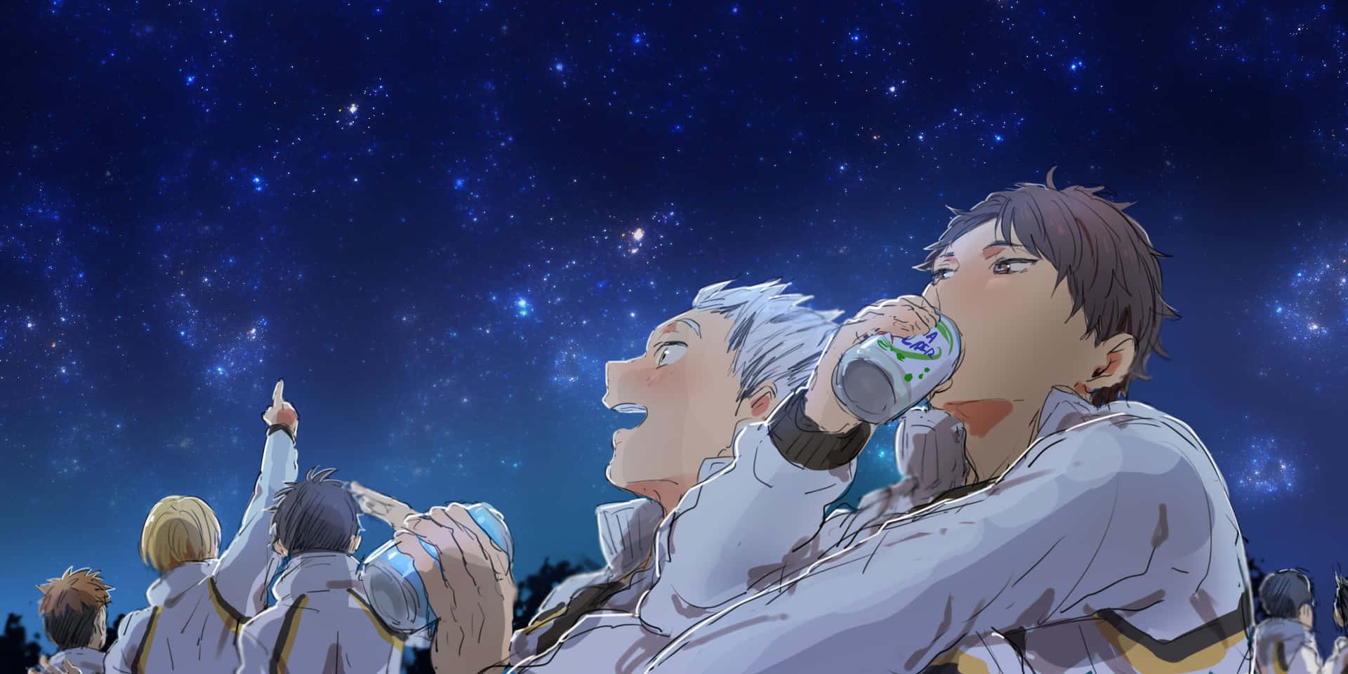 動畫團隊成員在星空下飲酒。