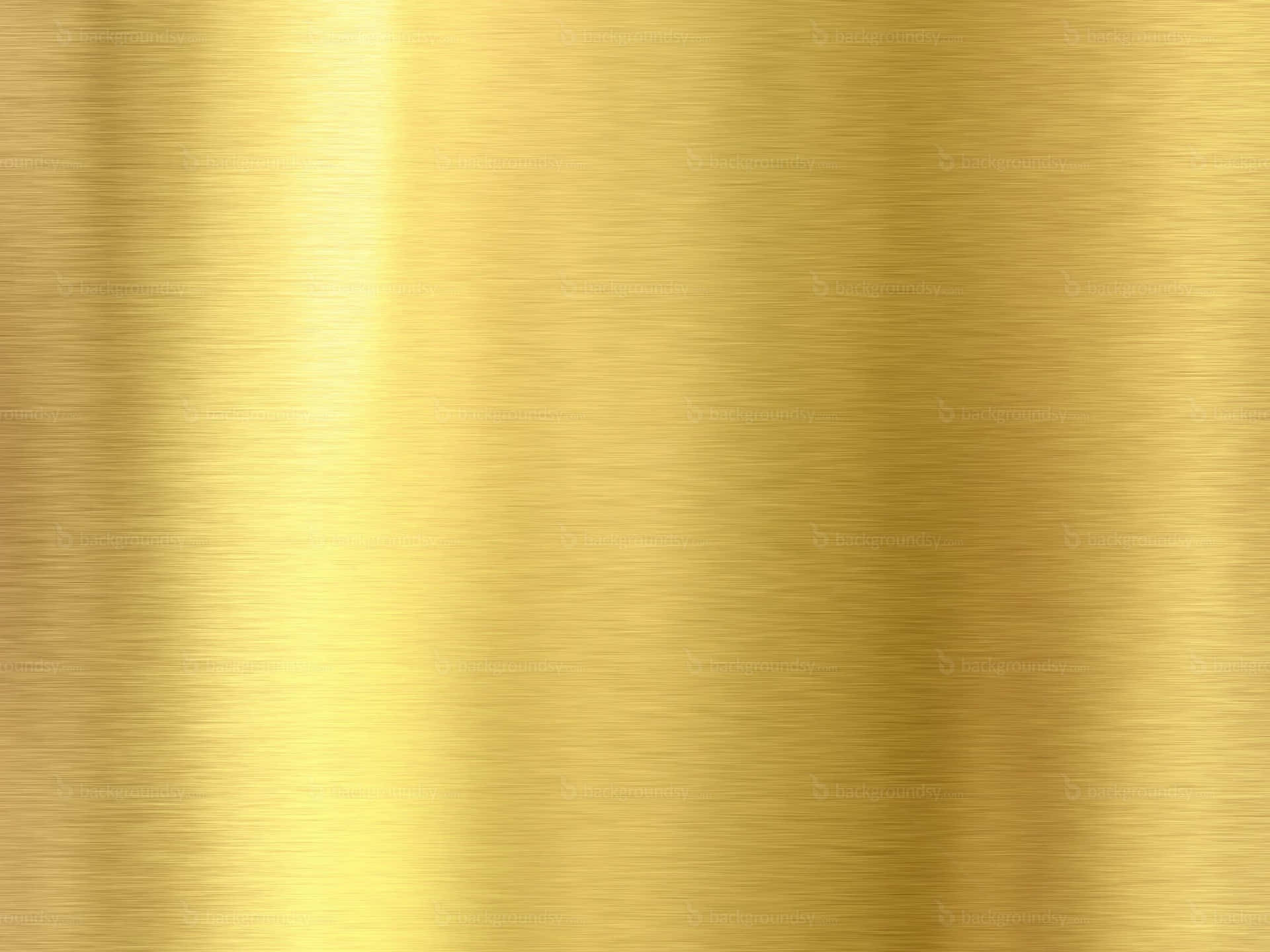 帶有光線漸變的拉絲金金屬紋理。