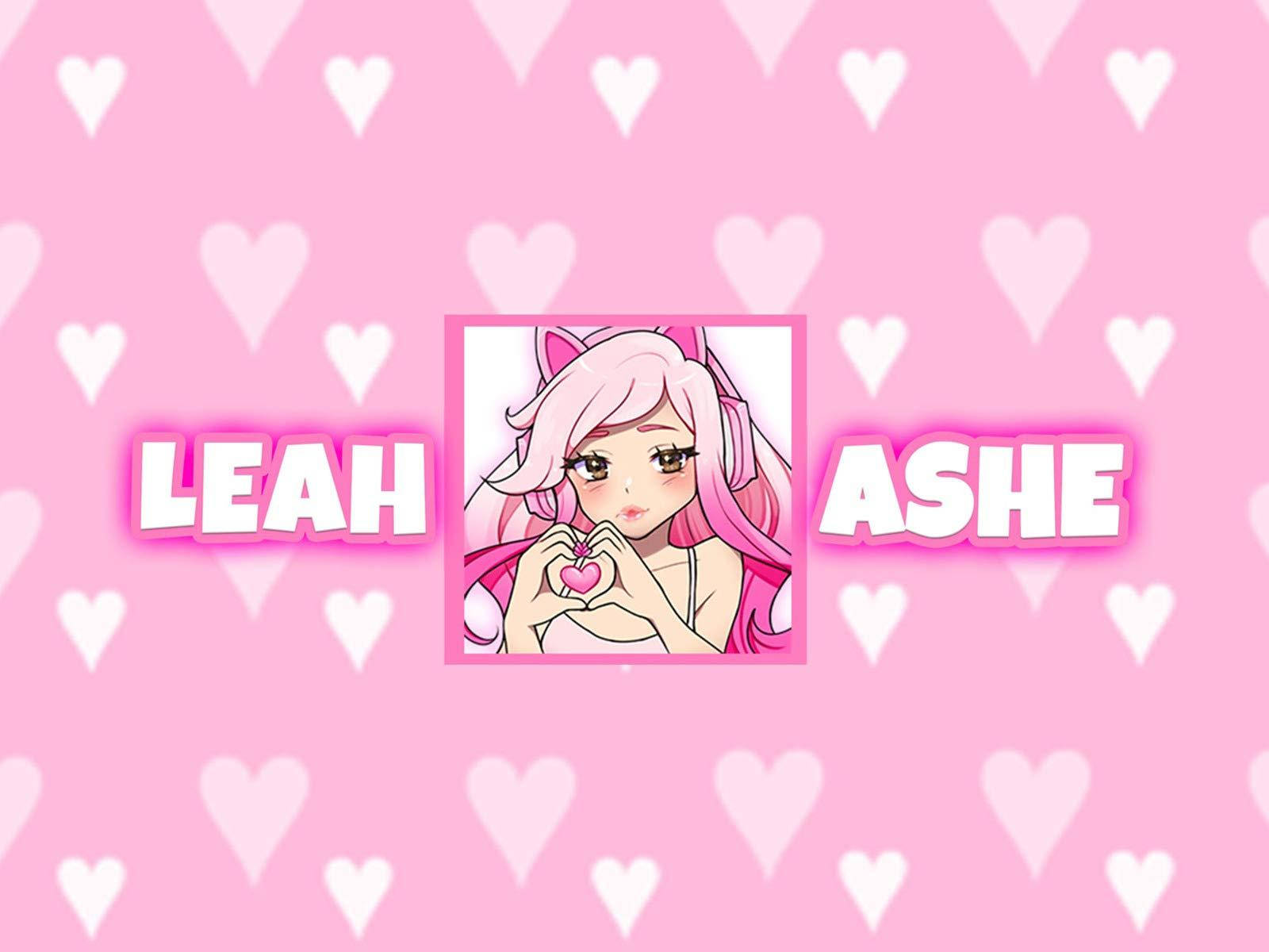 粉紅色頭髮的動漫女孩在Leah和Ashe名字之間用雙手做出心形。