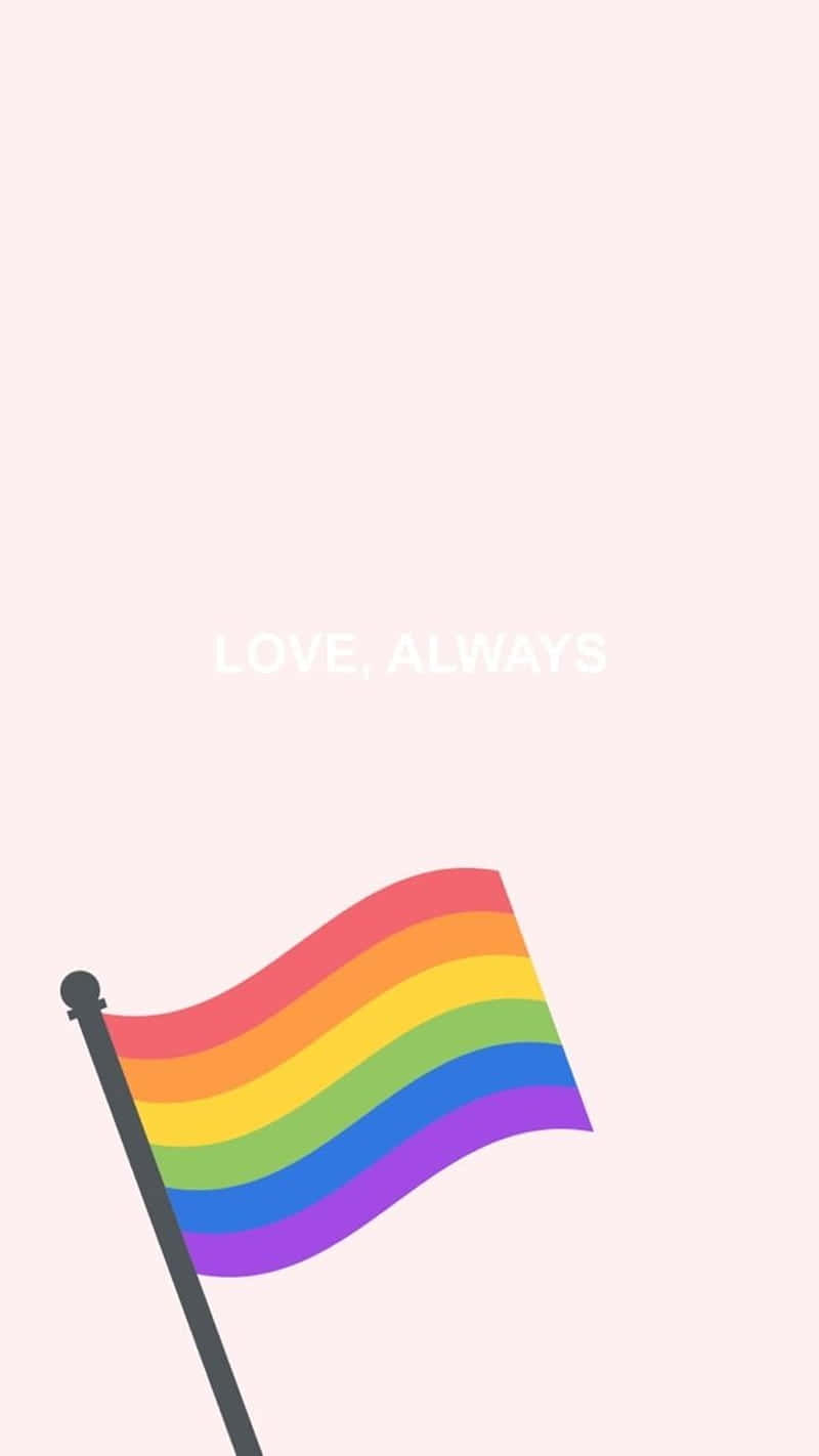 簡約美學可愛LGBT旗幟 壁紙 — 一面鮮豔的彩虹旗在柔和的粉紅色背景上輕輕飄揚，上面有白色的 love always 文字。