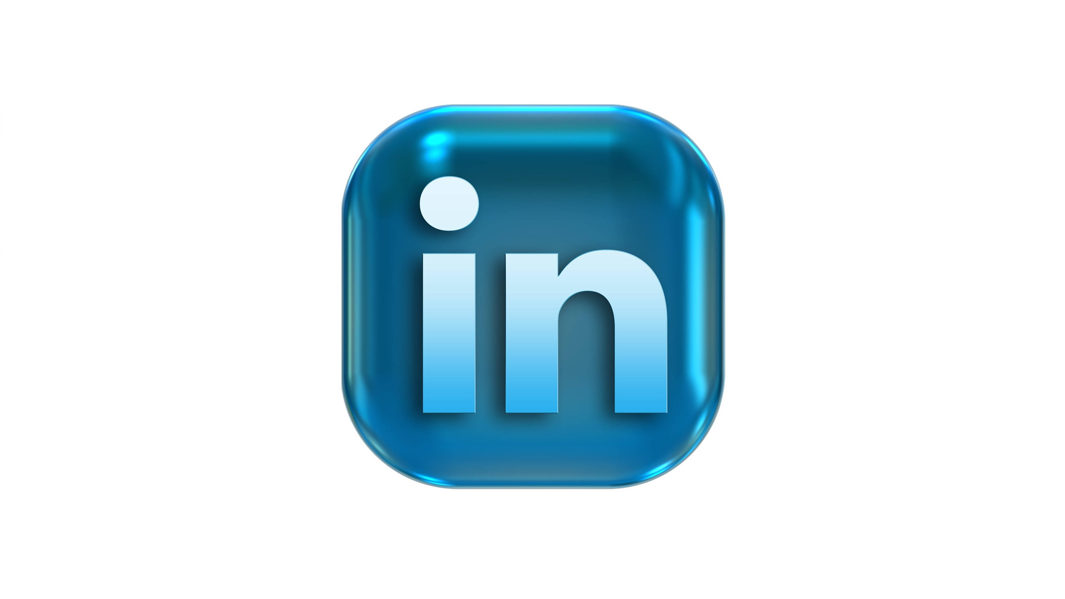 LinkedIn 3D立方體標誌 壁紙 — 一個帶有圓角和漸變陰影的亮面藍色LinkedIn應用程式圖標，背景為白色。
