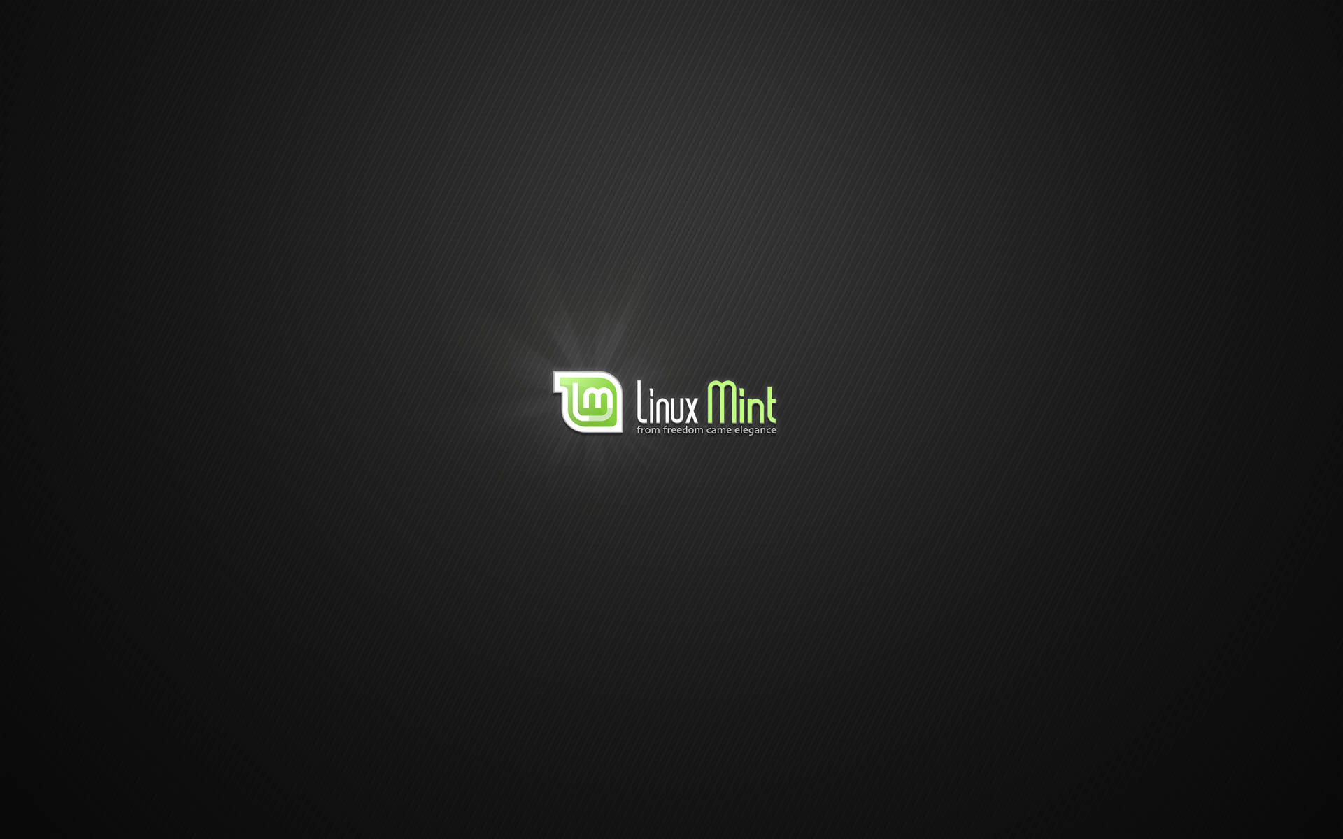 Linux Mint 標誌，帶有綠色文字和徽章，位於深色紋理背景上。