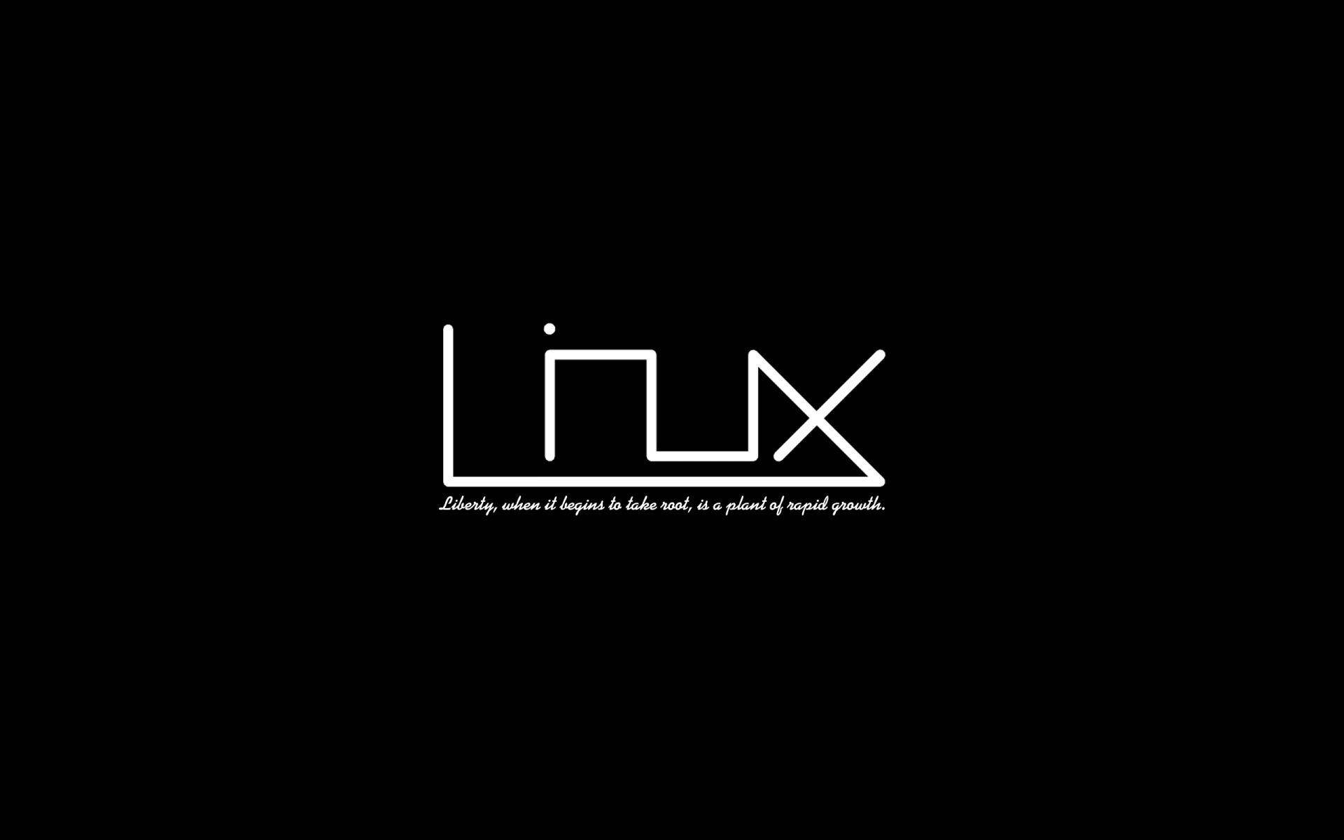 極簡主義 Linux 桌面字體藝術 壁紙 — 極簡黑色背景，帶有白色風格化的Linux標誌和關於自由與成長的引言。