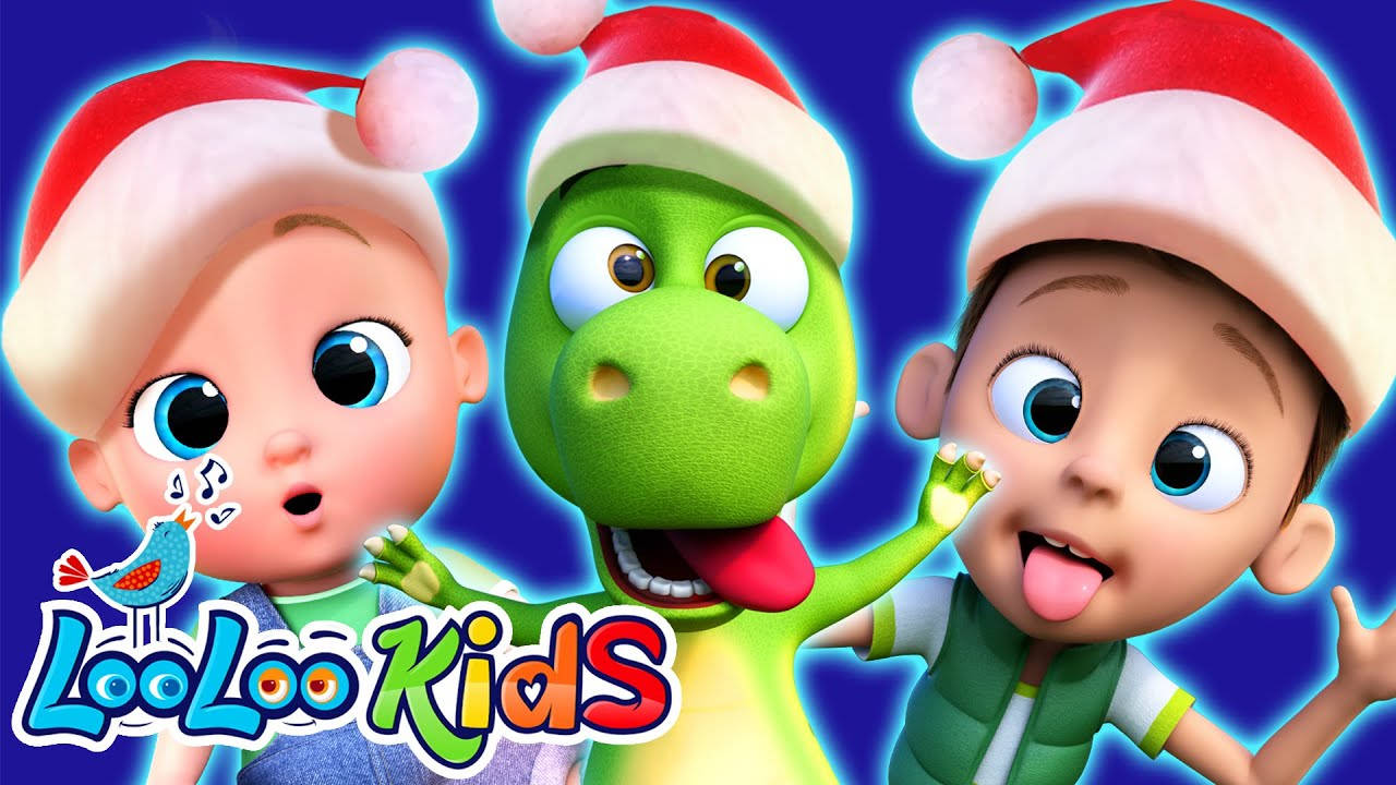 Looloo Kids搞笑聖誕帽 壁紙 — 三個快樂的卡通小孩和一隻戴著聖誕帽的綠色恐龍，背景是發光的藍色。