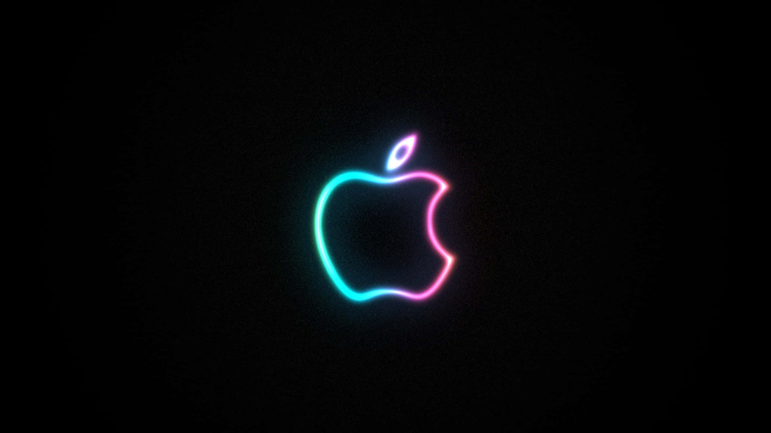 與 Mac 一同釋放黑暗 壁紙 — 一個發光的霓虹蘋果標誌，在漆黑虛空中閃爍著電光藍和粉紅色調。