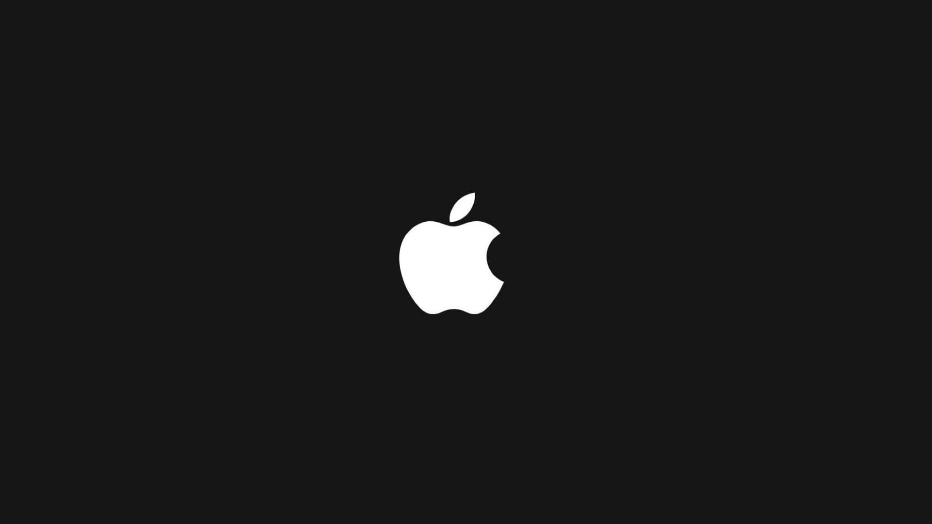 時尚黑色 MacBook – 科技的未來 壁紙 — 一個極簡的白色Apple標誌居中在純黑色背景上。
