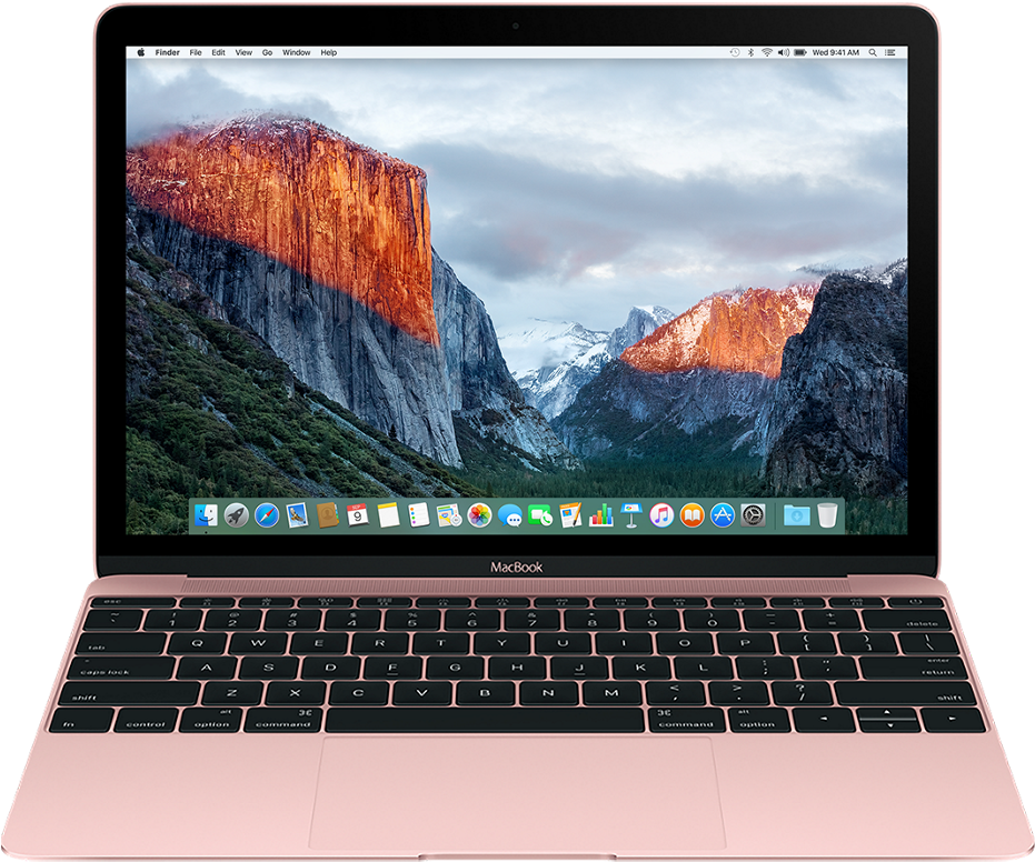 玫瑰金 MacBook Pro 顯示器 壁紙 — 玫瑰金色 MacBook 顯示戲劇性的山谷壁紙，金色陽光照射花崗岩懸崖，背景為多雲天空。