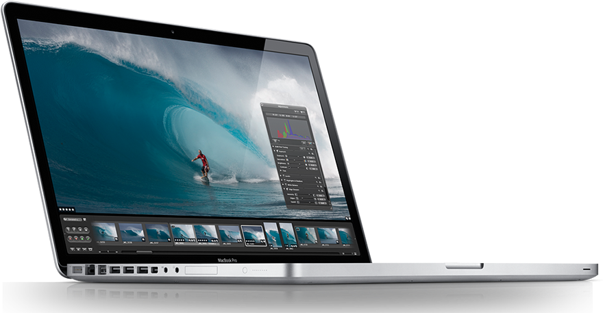 MacBook Pro 展示衝浪影像 壁紙 — 一部時尚的銀色手提電腦顯示一名衝浪者正在乘著巨大的藍綠色海浪，並打開了照片編輯軟件。
