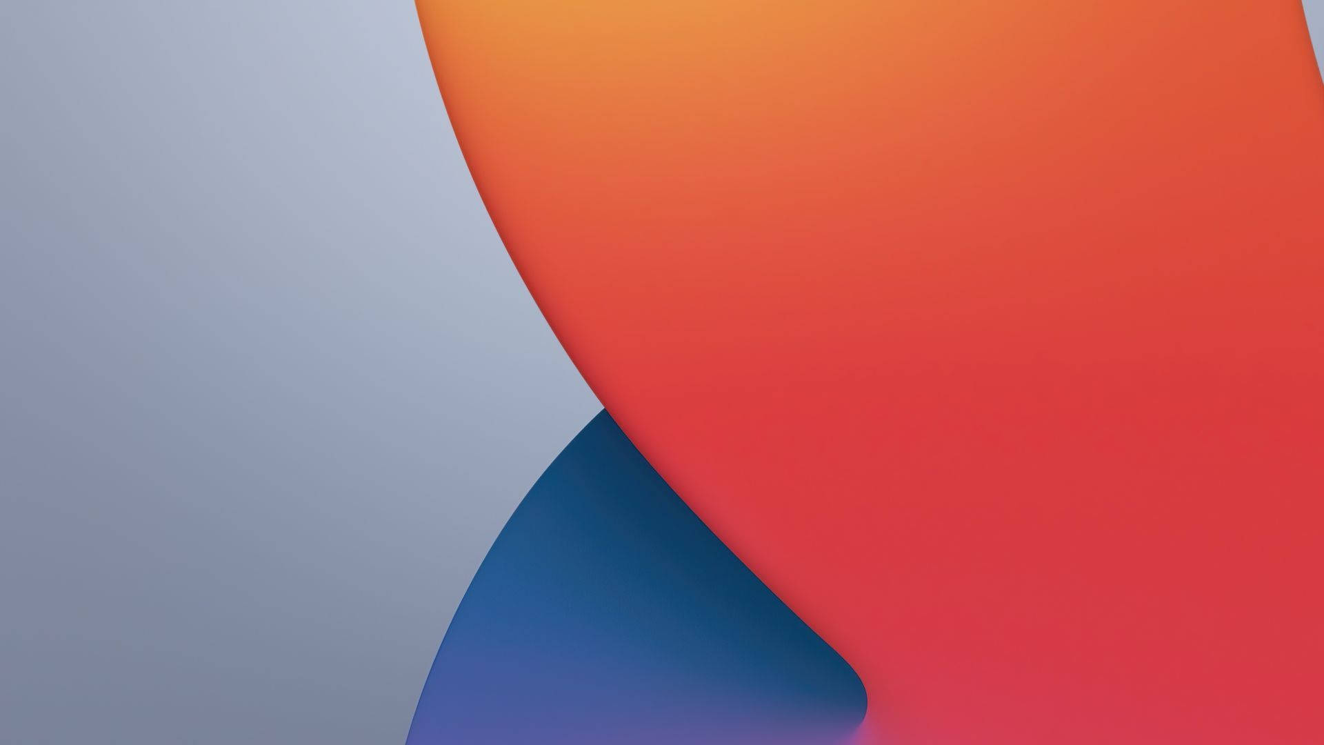 macOS Big Sur 抽象圖形 壁紙 — 充滿活力的抽象形狀，以橙色、紅色和藍色漸變流動在柔和的灰色背景上。