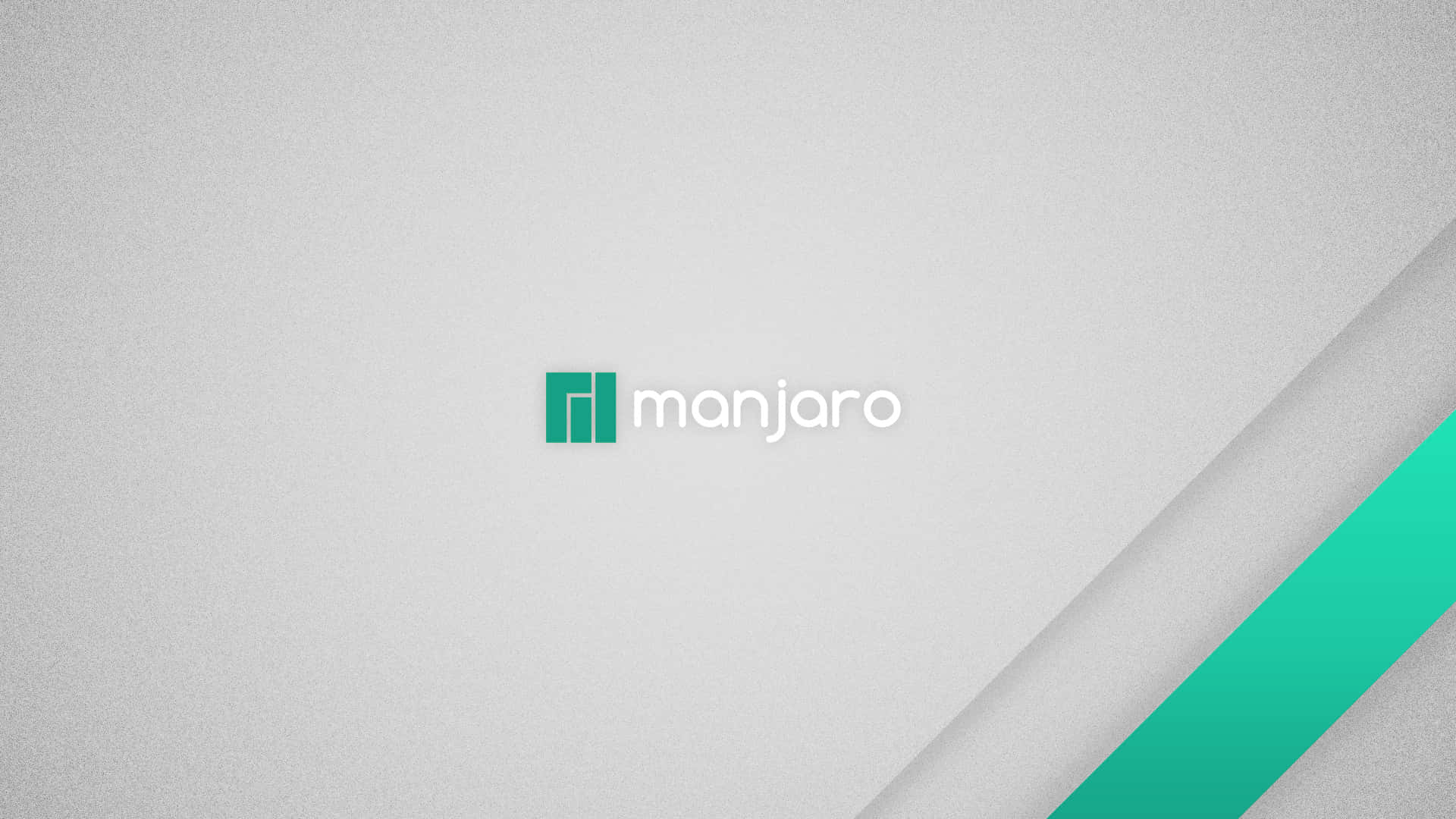 灰色背景上帶有青綠色斜紋的 Manjaro 標誌。