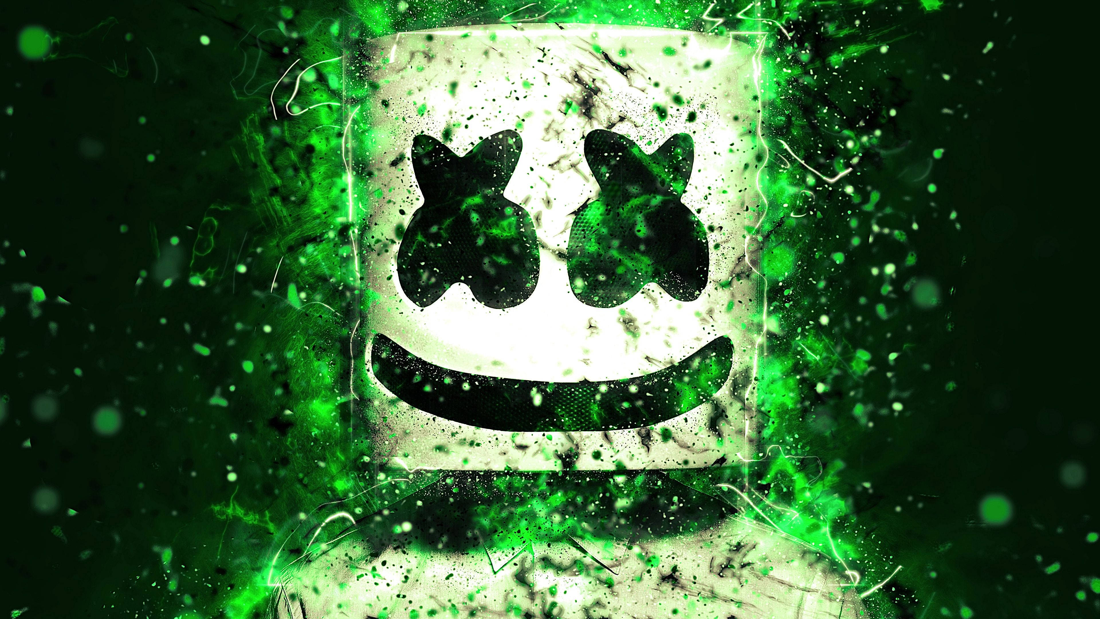 Marshmallow DJ 綠色面具 壁紙 — 發光的綠色飛濺效果圍繞著一個白色方形面具，面具上有黑色X眼睛和微笑，背景為深色。