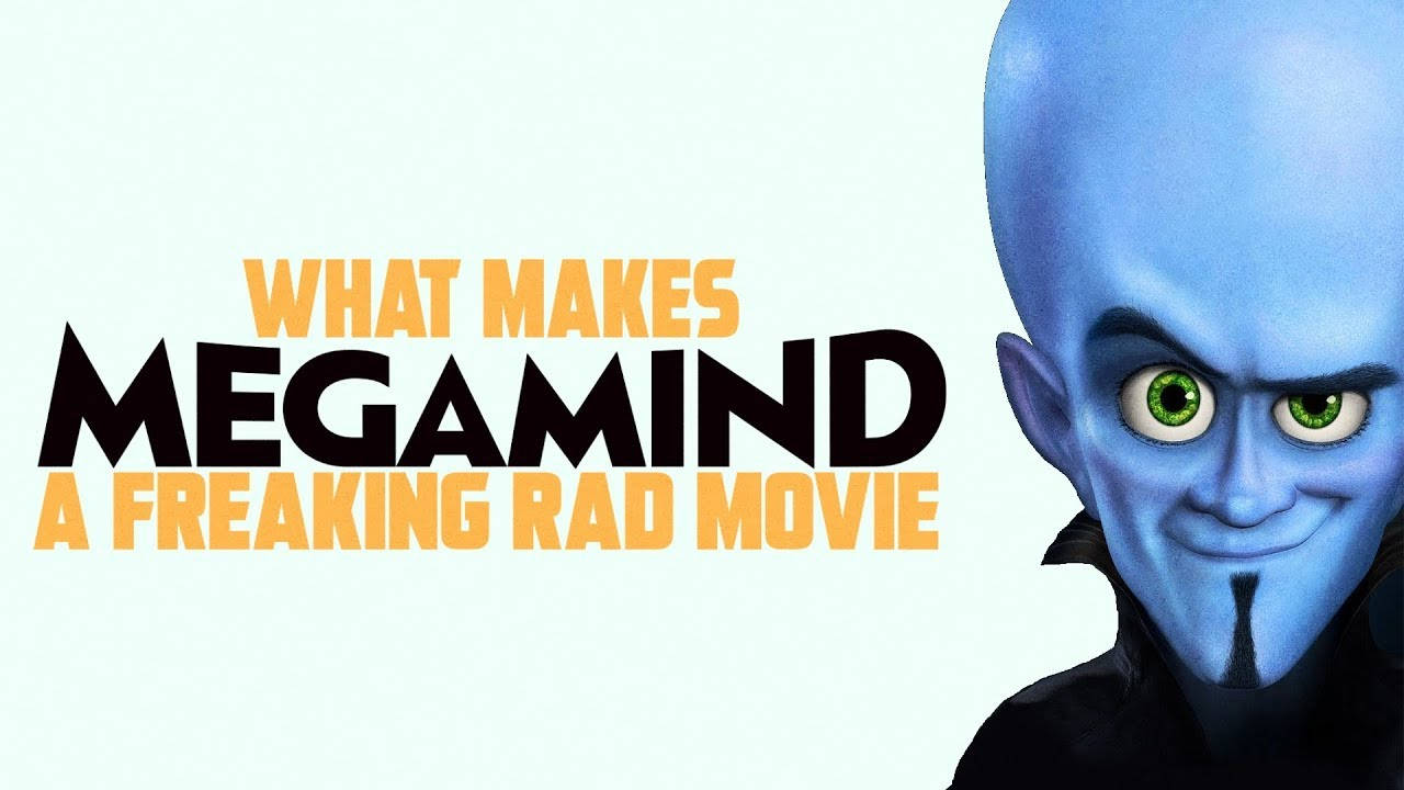 Megamind 搞笑電影海報 壁紙 — 藍皮膚反派 Megamind 綠色眼睛，喺讚揚電影嘅粗體文字旁邊冷笑。