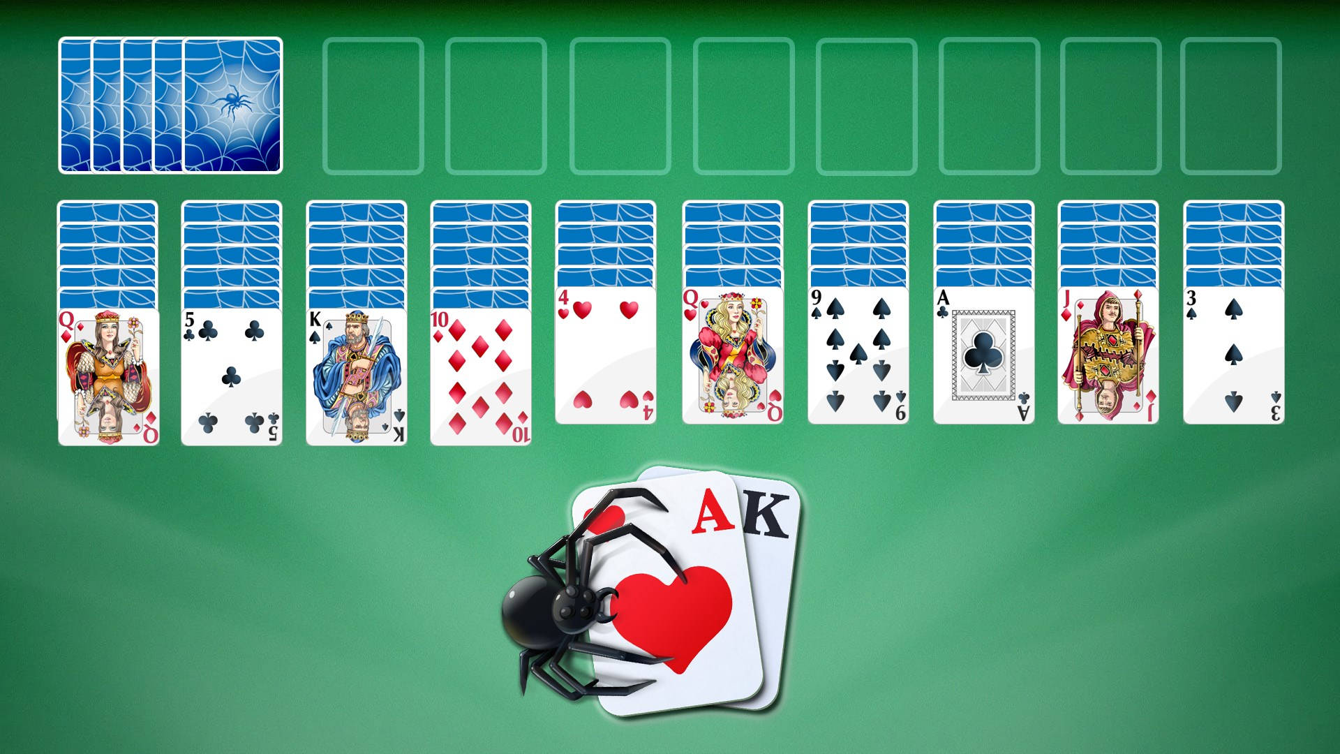 蜘蛛喺綠色氈桌上嘅 Ace 同 King of Hearts 啤牌上面。