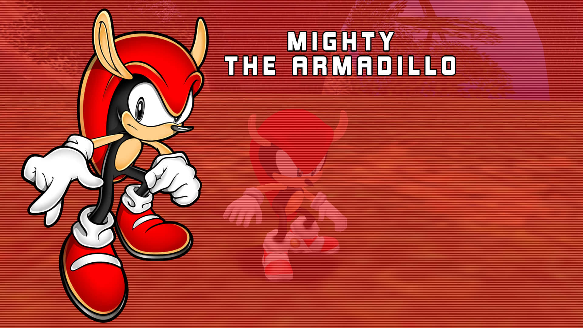 Mighty The Armadillo 桌布 壁紙 — Mighty the Armadillo 自信地站在大膽的紅色背景上，他的名字以白色粗體字顯示。