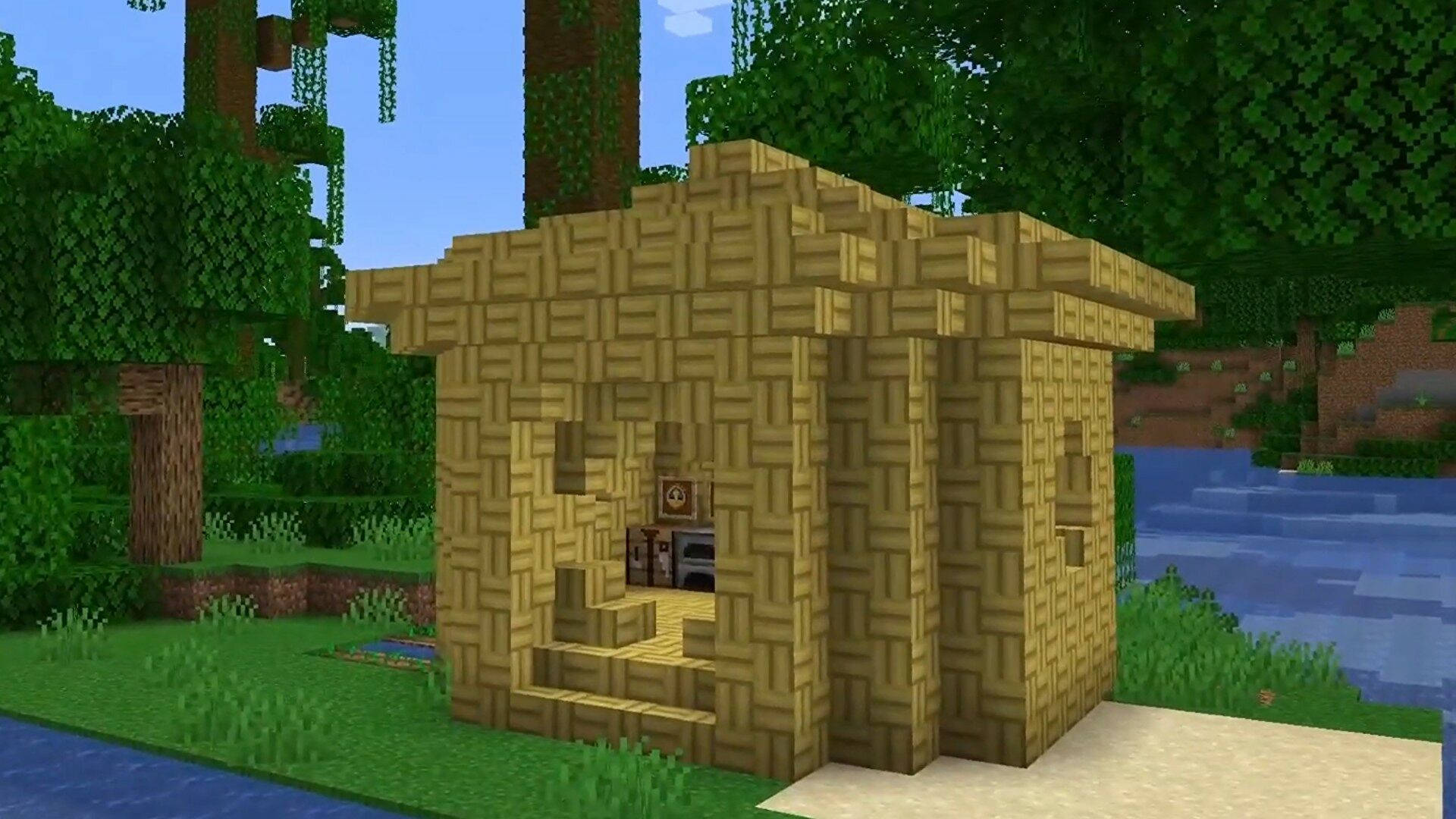 Minecraft 高清森林茅草屋壁紙 壁紙 — 一間像素風格的木屋，茅草屋頂，坐落在茂密的Minecraft森林中的河邊，天空湛藍清澈。