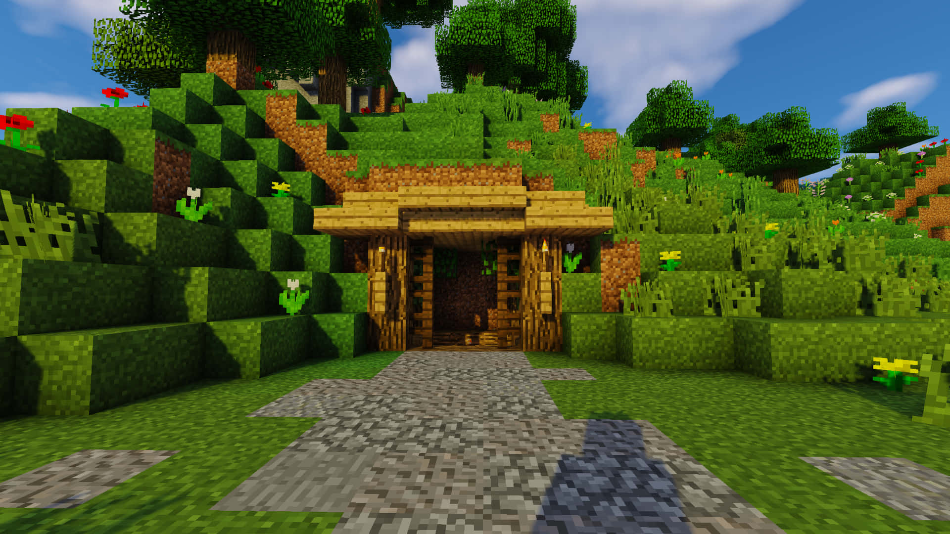 一座Minecraft木屋位於草坡上，有一條石徑通往它。