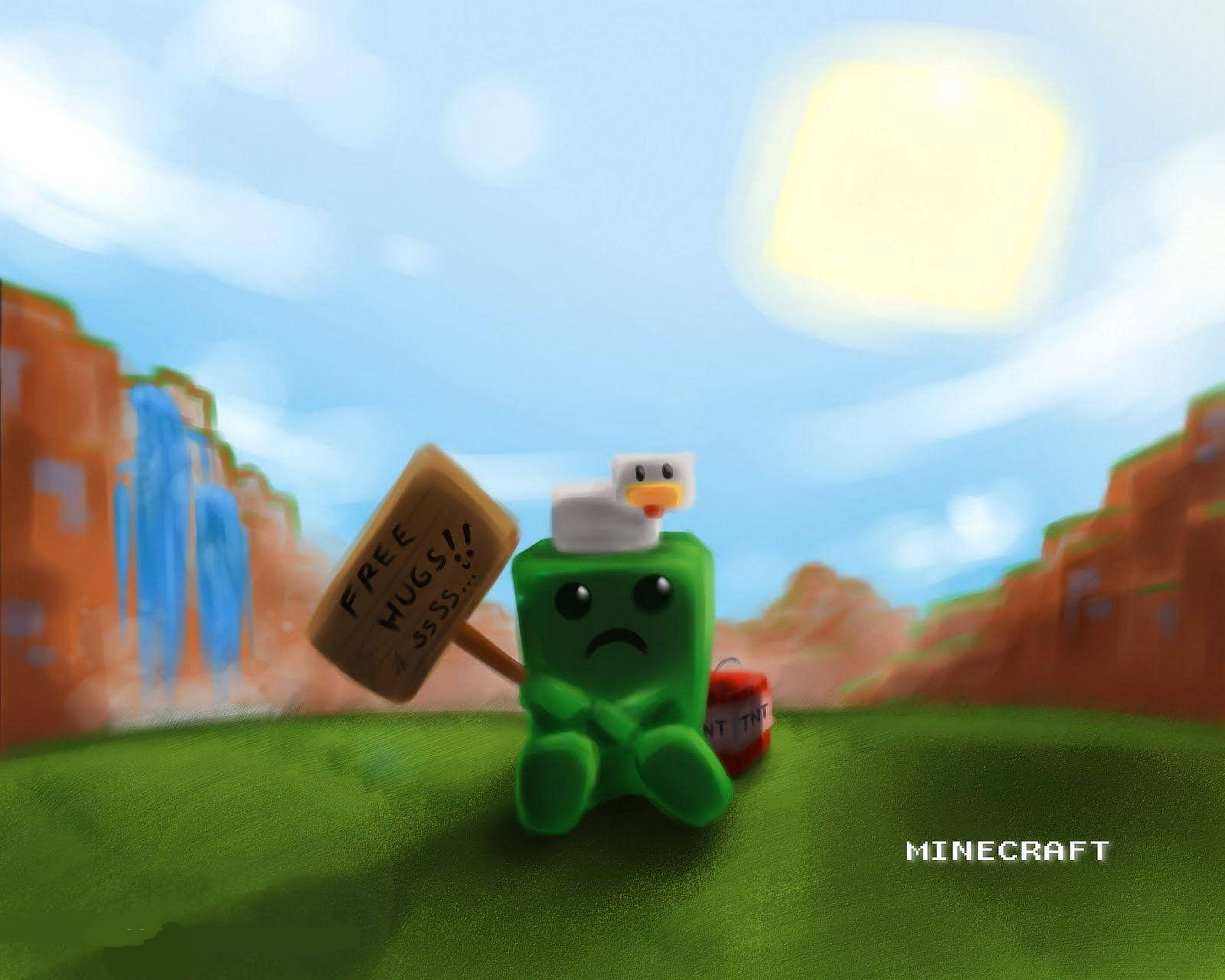 Minecraft苦力怕同人藝術 壁紙 — 一隻綠色Minecraft苦力怕，帶著悲傷的表情，頭上有一隻鴨子，在陽光明媚的草地上舉著「FREE HUGS!!」的牌子。