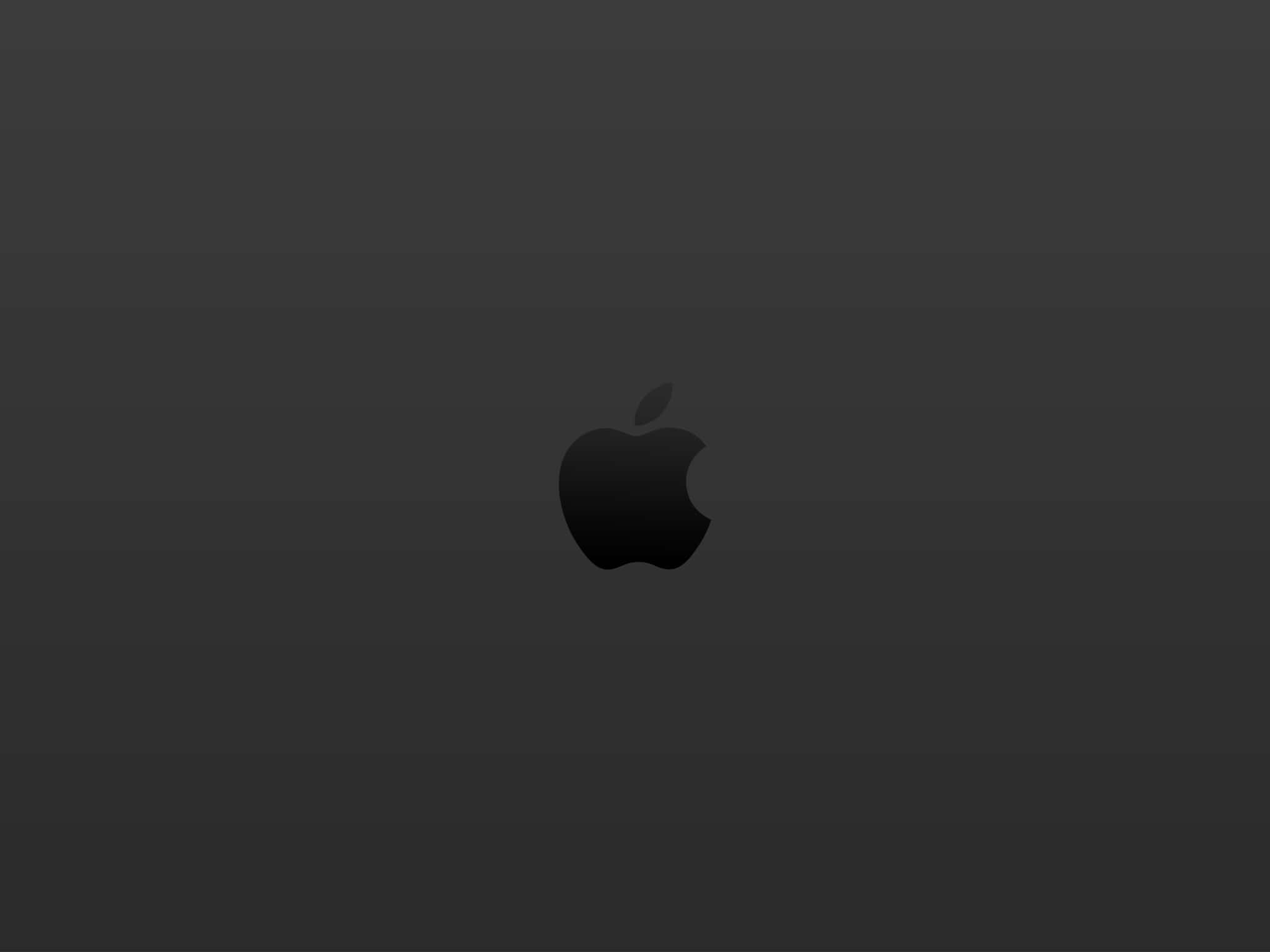 深灰色漸變背景上的黑色Apple標誌