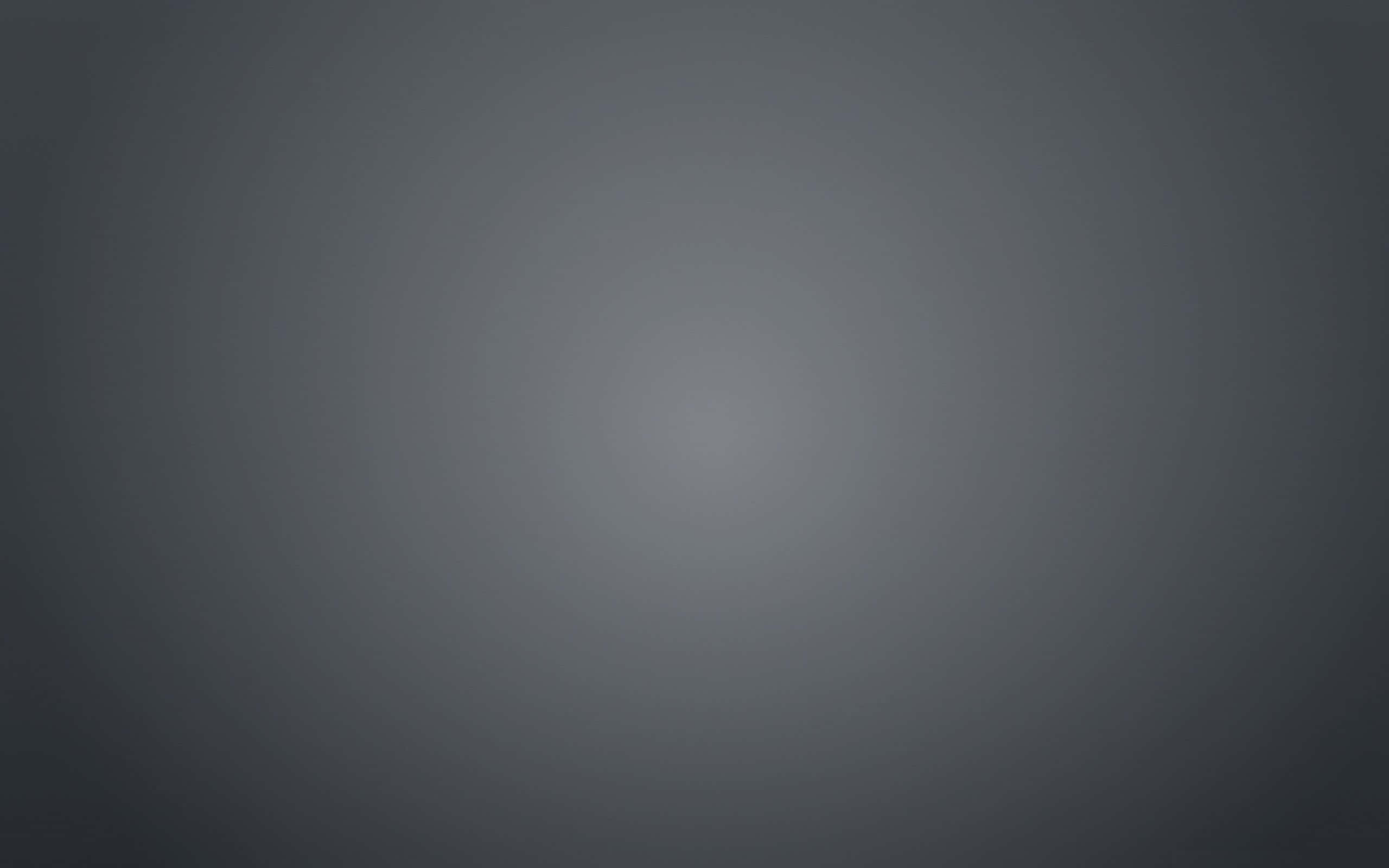 Grey Texture 桌布 壁紙 — 極簡漸變壁紙，柔和灰色調從深色邊緣漸變至明亮中心。