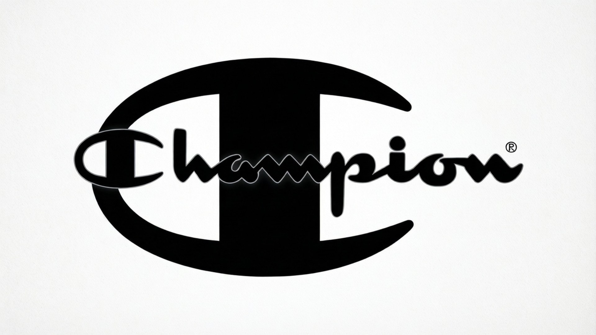 白色背景上的黑色Champion標誌，帶有草書文字和註冊符號