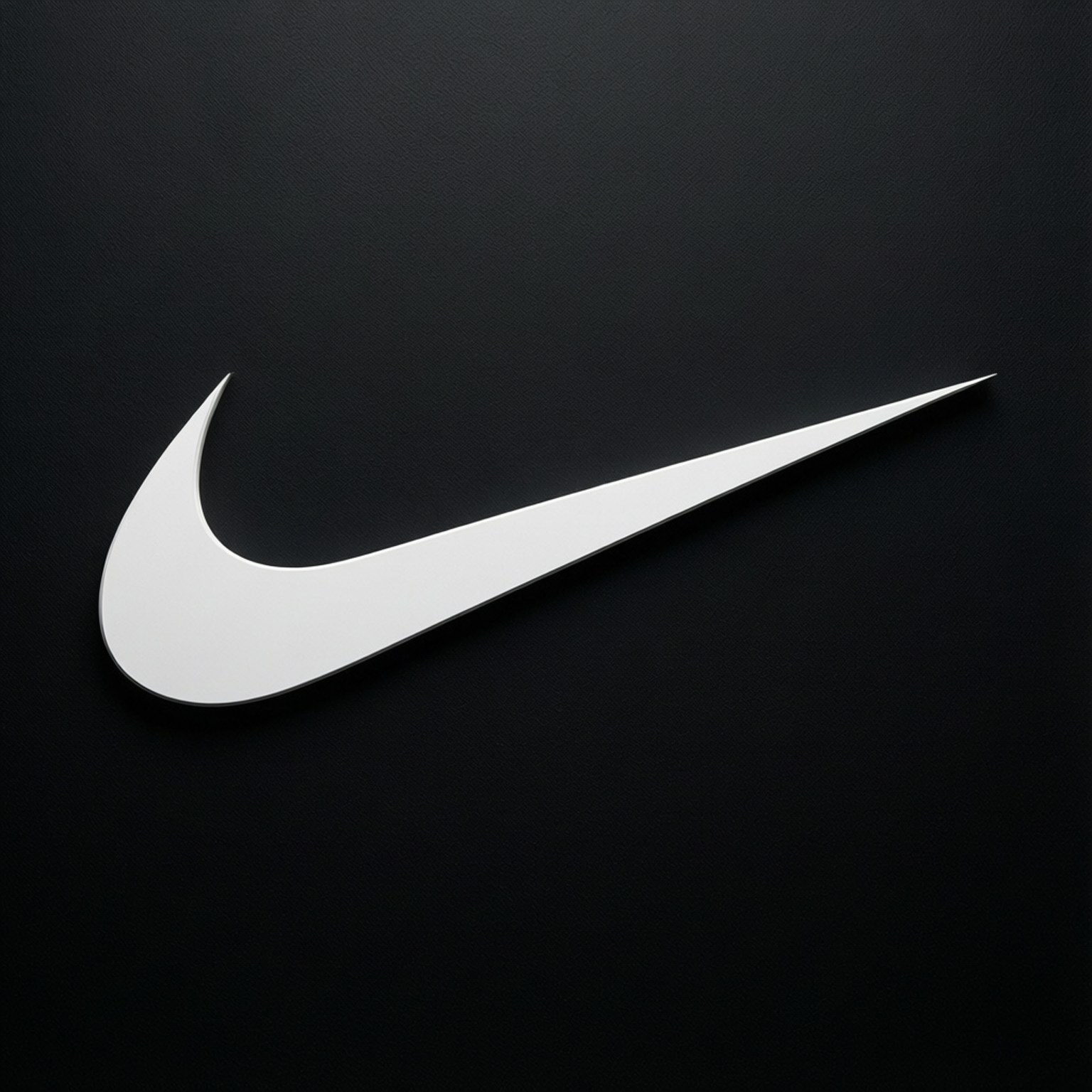 白色Nike swoosh標誌在黑色紋理背景上