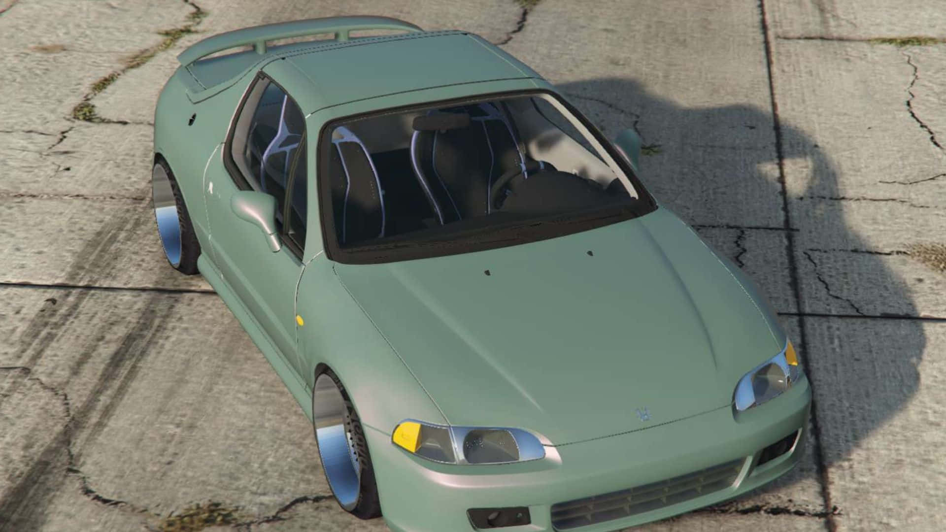Honda Civic Del Sol 桌布 壁紙 — 一輛薄荷綠改裝跑車配備訂製輪圈，停在裂開的混凝土上，在明亮的日光下。