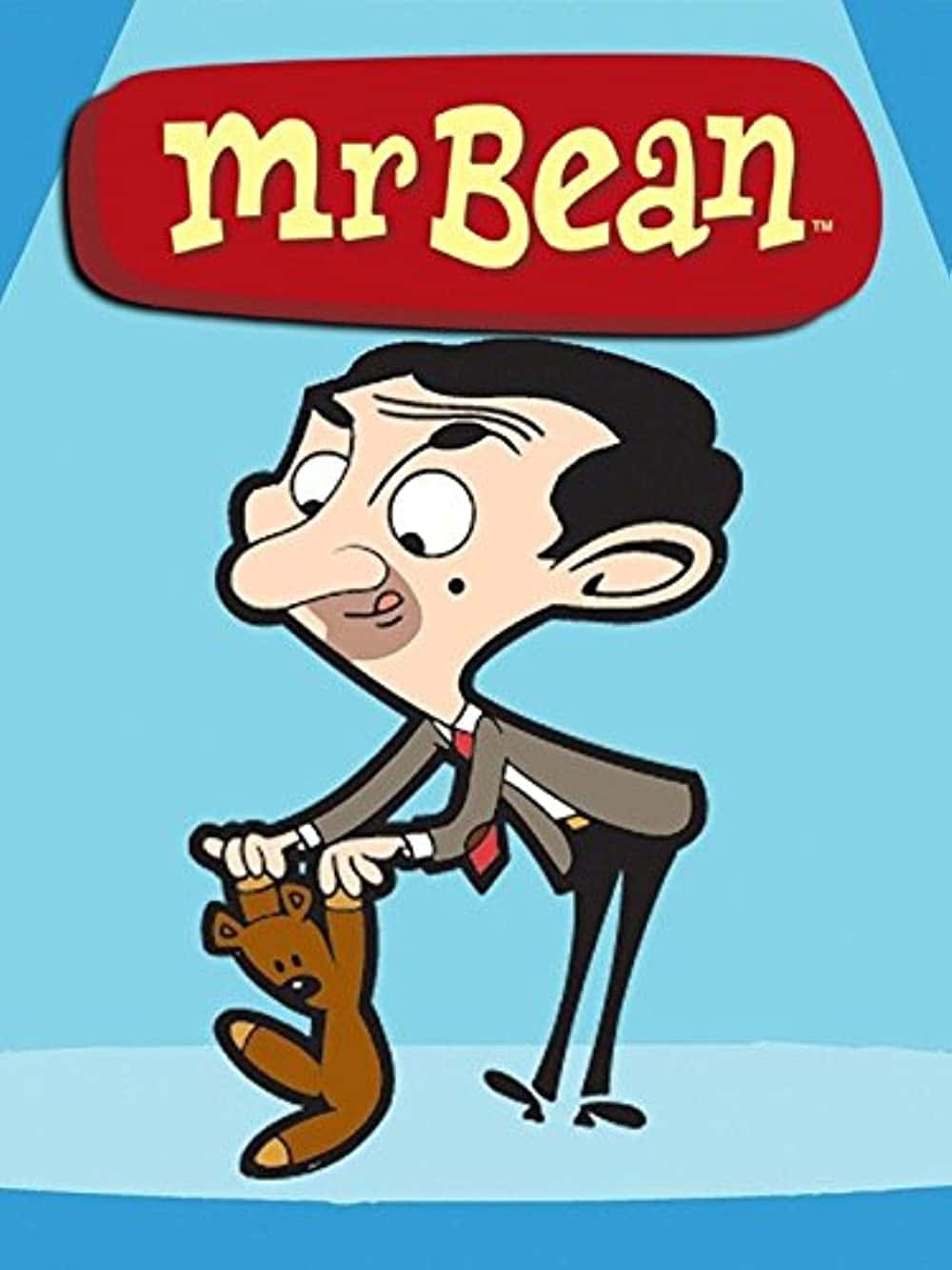 Mr Bean 桌布 壁紙 — Mr Bean 卡通角色在聚光燈下抱著一隻泰迪熊，上方有他的名字標誌。