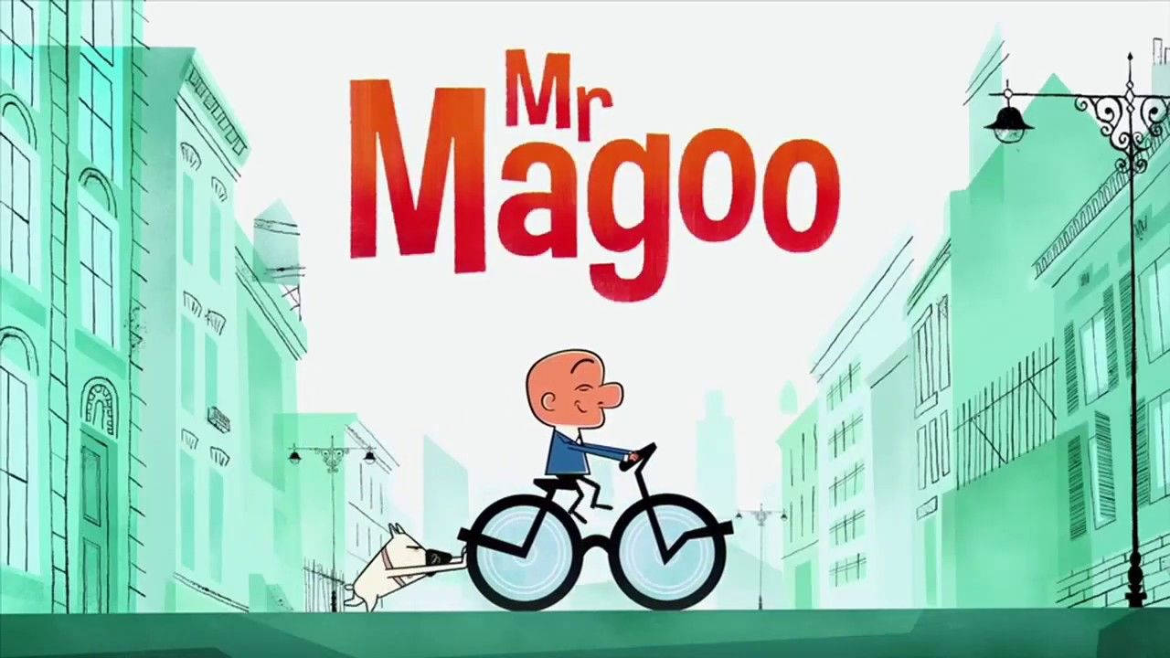 Mr Magoo 騎自行車 壁紙 — 一個卡通男人騎著單車沿著綠色調的城市街道行駛，一隻狗拉著他的單車，上方有「Mr Magoo」文字。